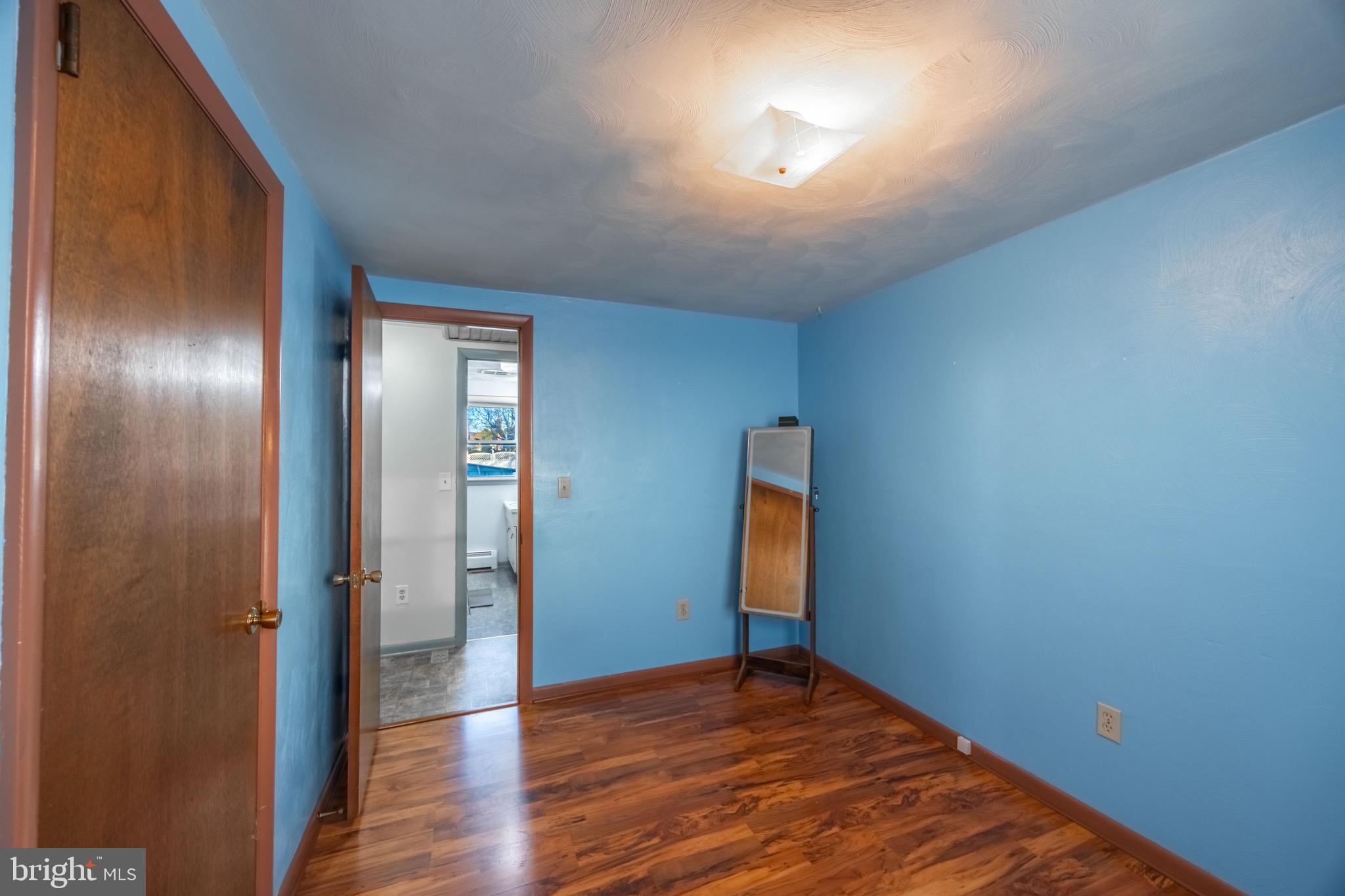 110 South Blettner Avenue Hanover, PA 17331 - Photo 14 of 30 a view of an empty room with wooden floor