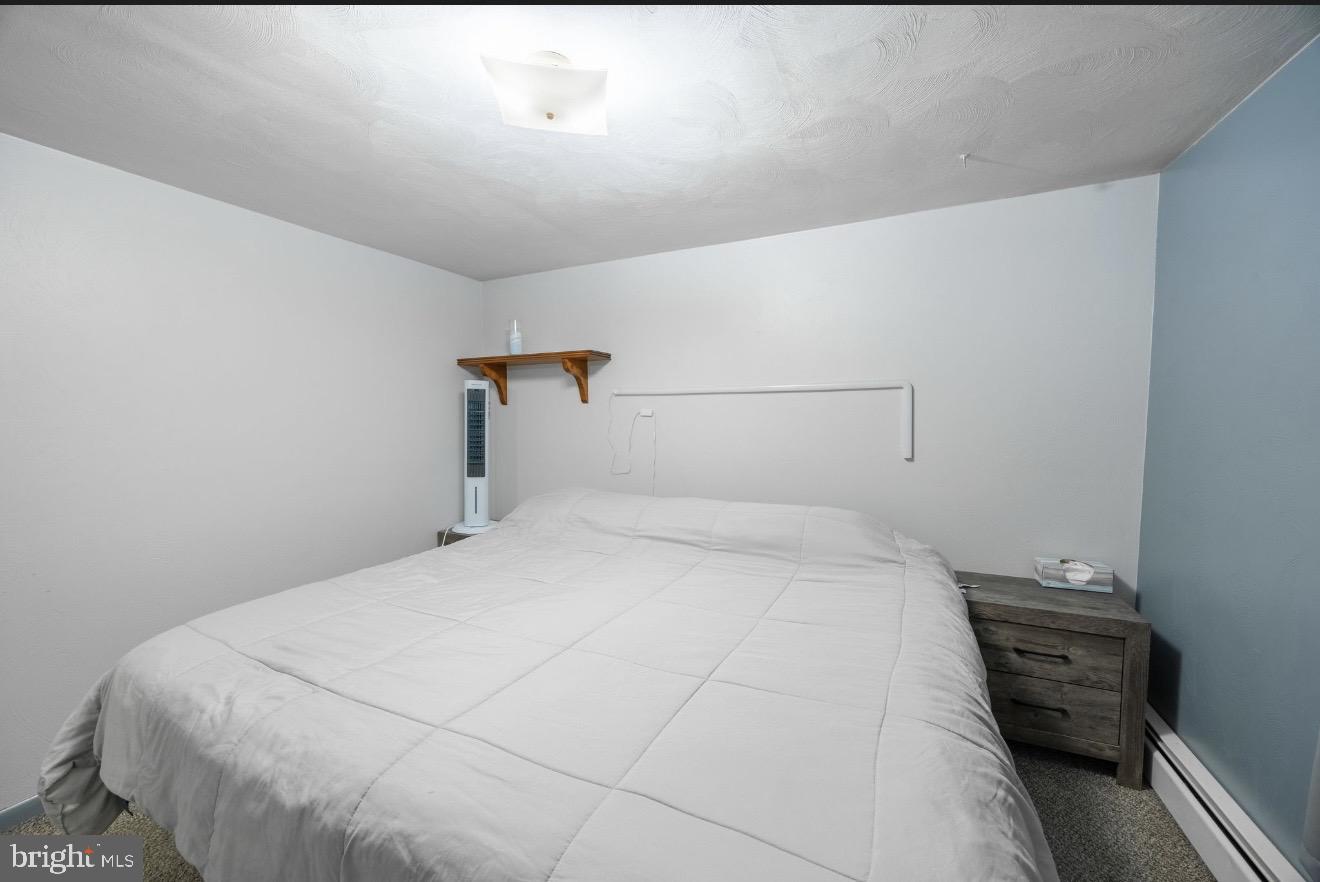 110 South Blettner Avenue Hanover, PA 17331 - Photo 19 of 30 a bedroom with a bed and a table