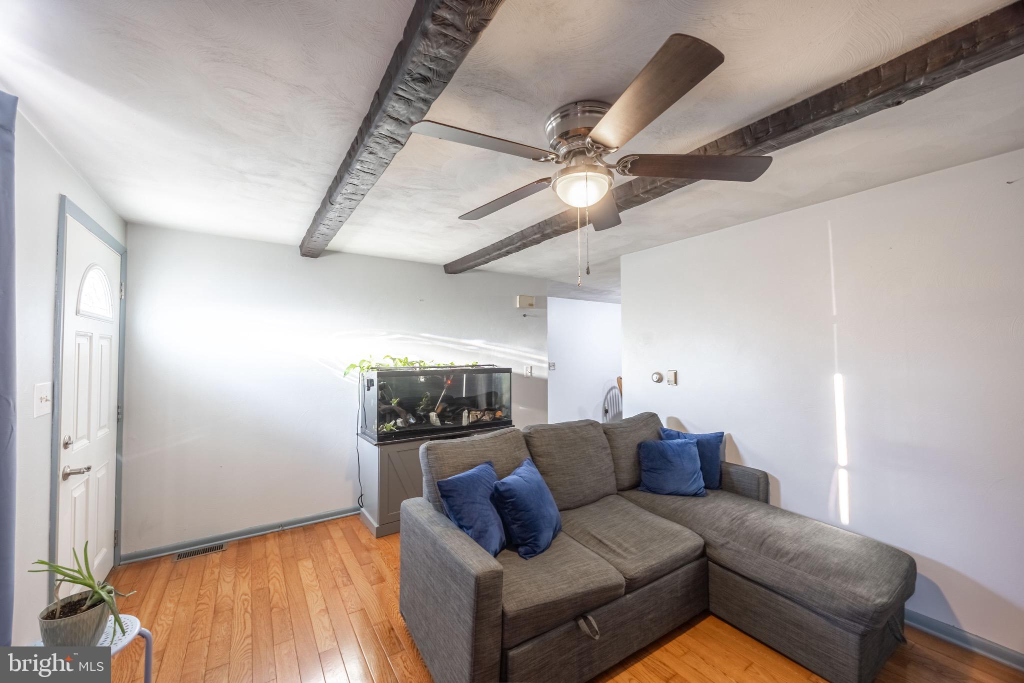 110 South Blettner Avenue Hanover, PA 17331 - Photo 4 of 30 a living room with furniture and a flat screen tv