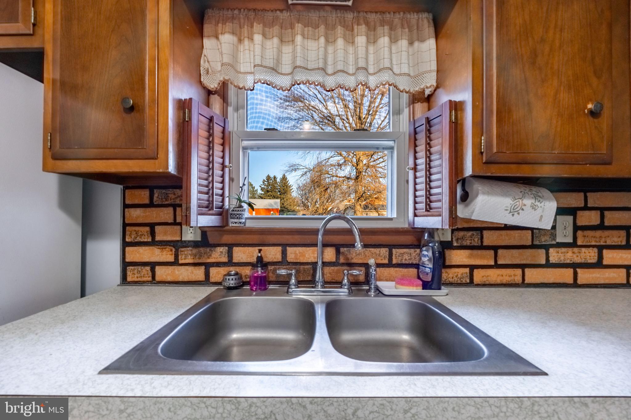 110 South Blettner Avenue Hanover, PA 17331 - Photo 8 of 30 a kitchen with a sink and a cabinet with wooden floor