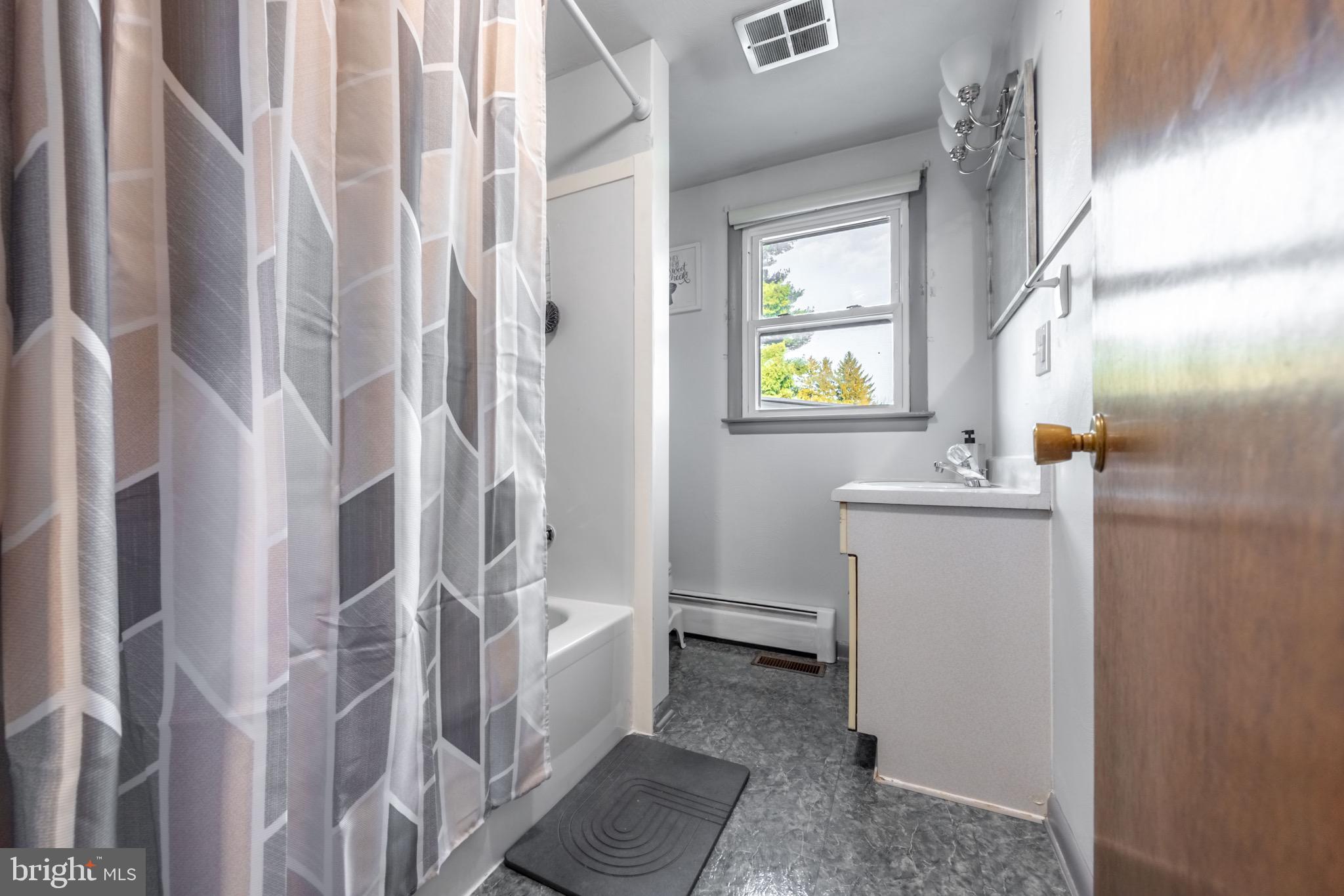 110 South Blettner Avenue Hanover, PA 17331 - Photo 10 of 30 a bathroom with a bathtub and shower