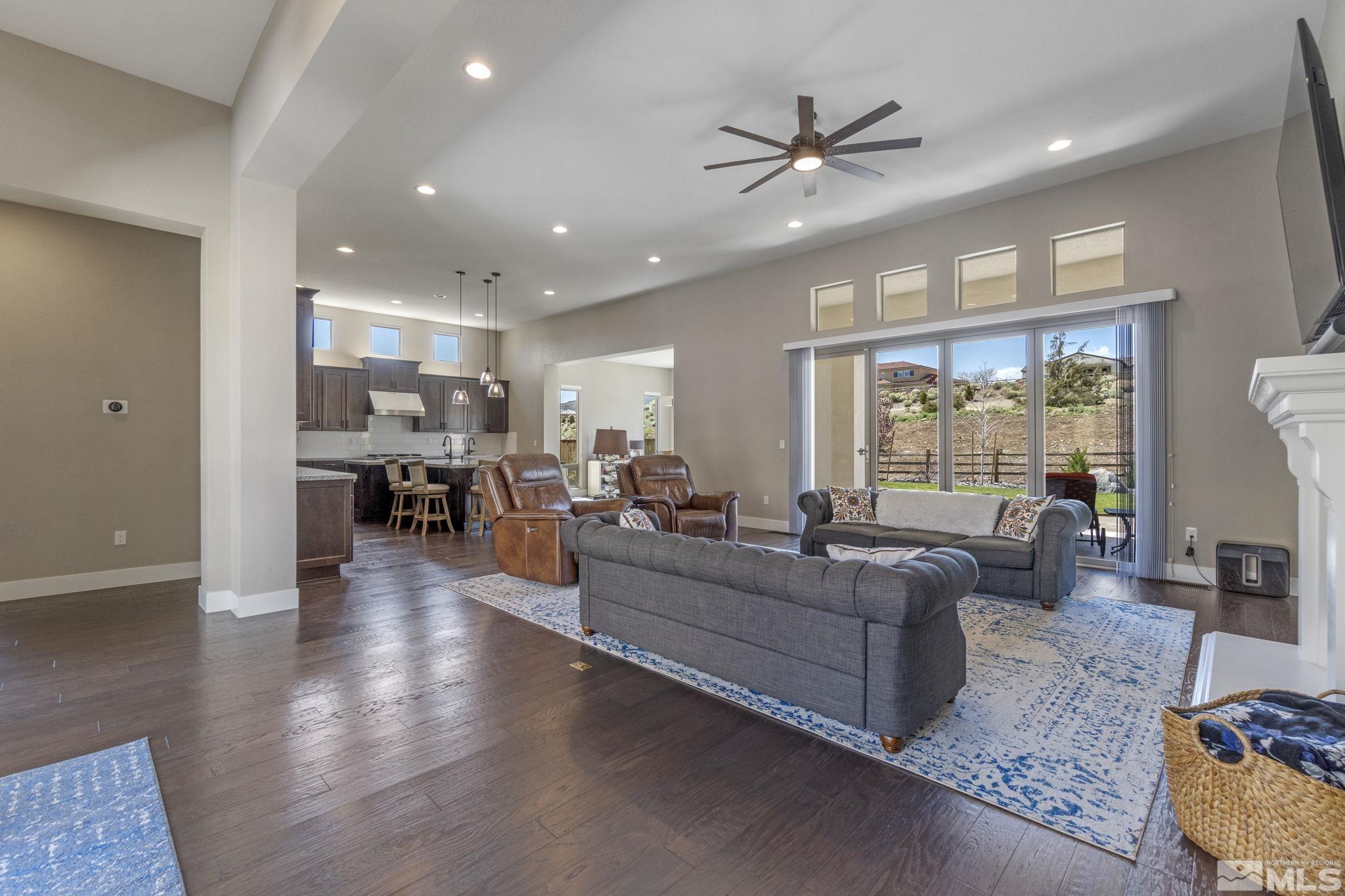 13357 Travertine Lane Reno, NV 89511 - Photo 11 of 39 a living room with furniture and a large window