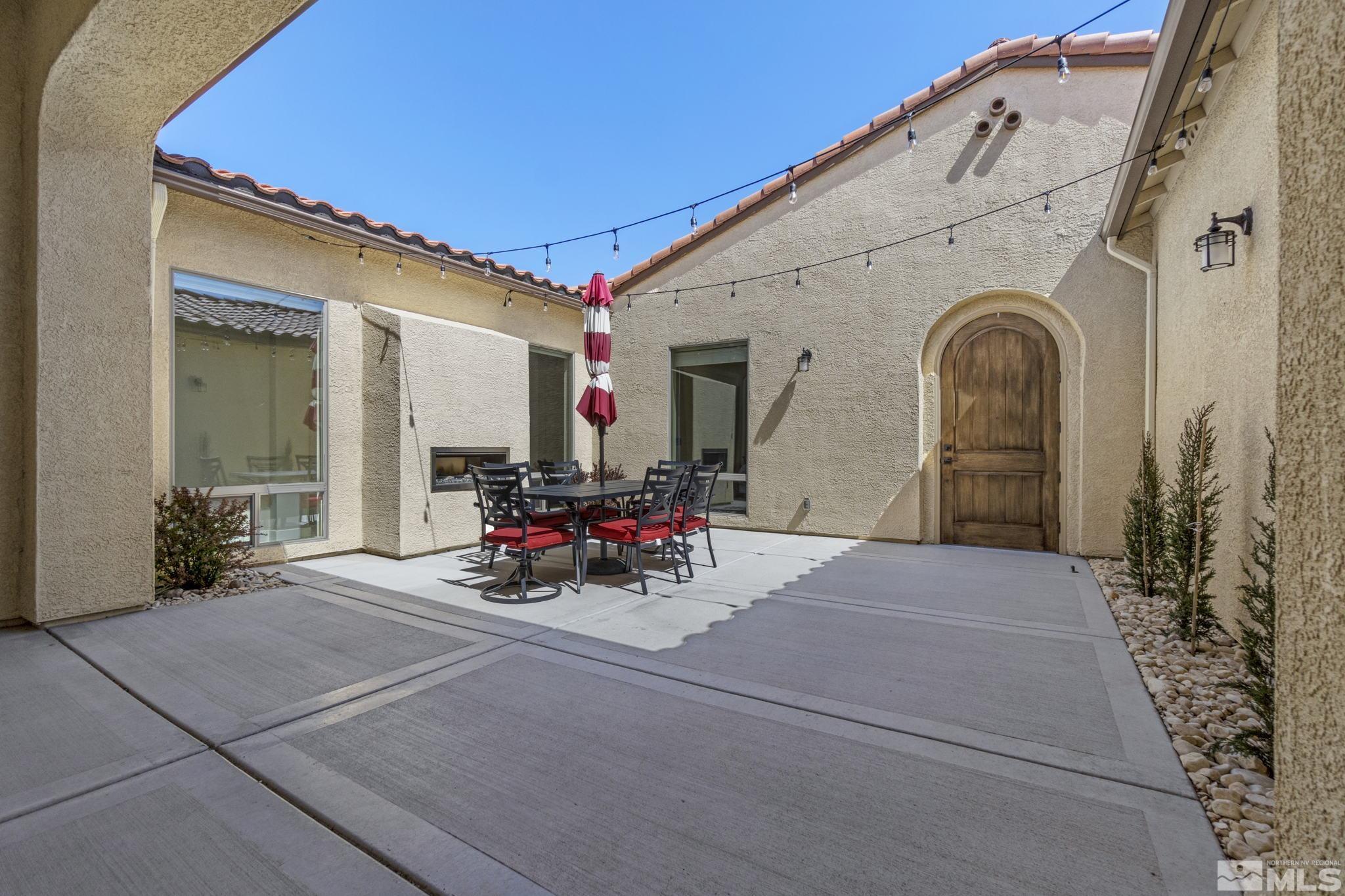 13357 Travertine Lane Reno, NV 89511 - Photo 5 of 39 a view of front door with outdoor seating