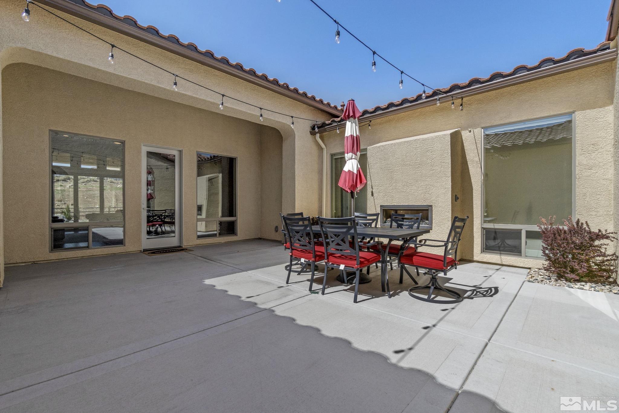 13357 Travertine Lane Reno, NV 89511 - Photo 6 of 39 a view of living room with chairs and tables