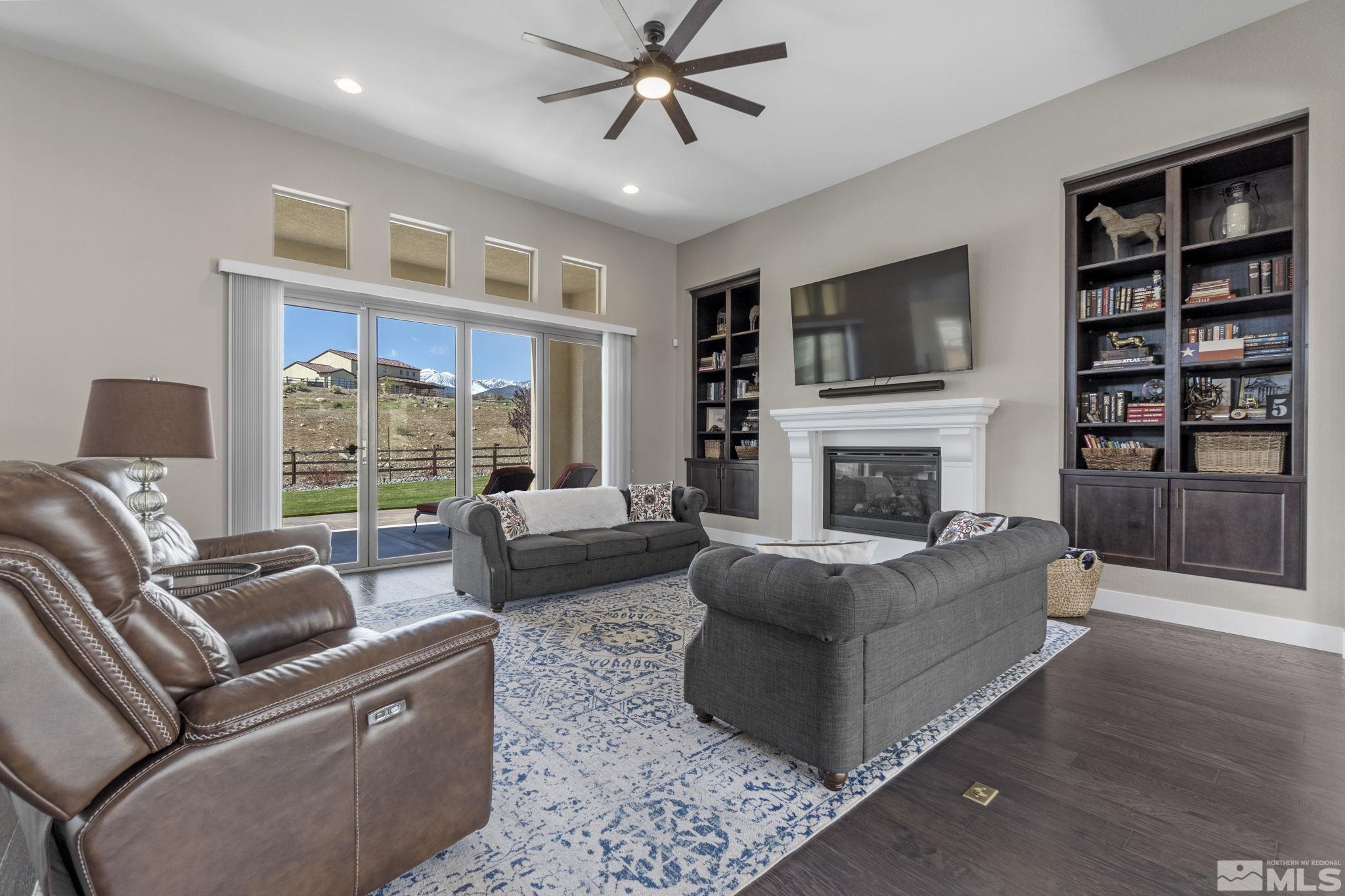 13357 Travertine Lane Reno, NV 89511 - Photo 7 of 39 a living room with furniture fireplace and flat screen tv