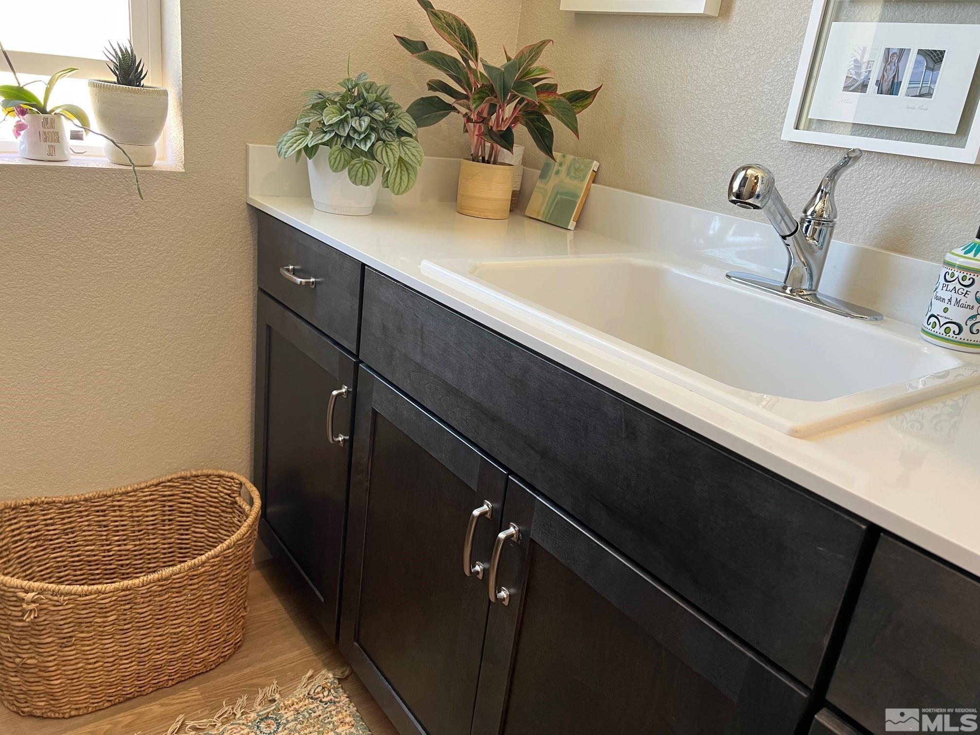 2833 Thistle Pine Court Reno, NV 89521 - Photo 14 of 25 a bathroom with a sink and a mirror