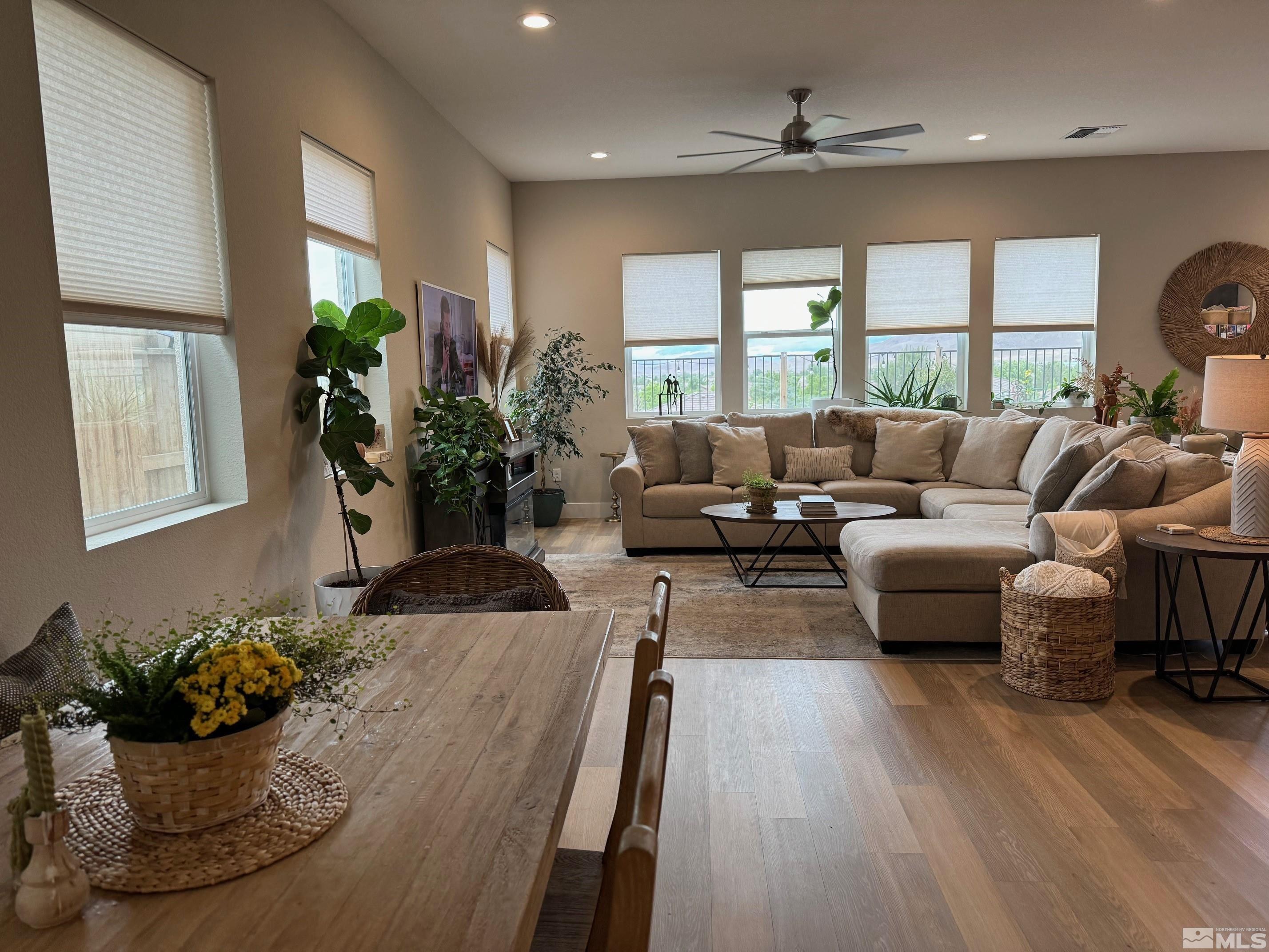 2833 Thistle Pine Court Reno, NV 89521 - Photo 2 of 25 a living room with furniture and a large window
