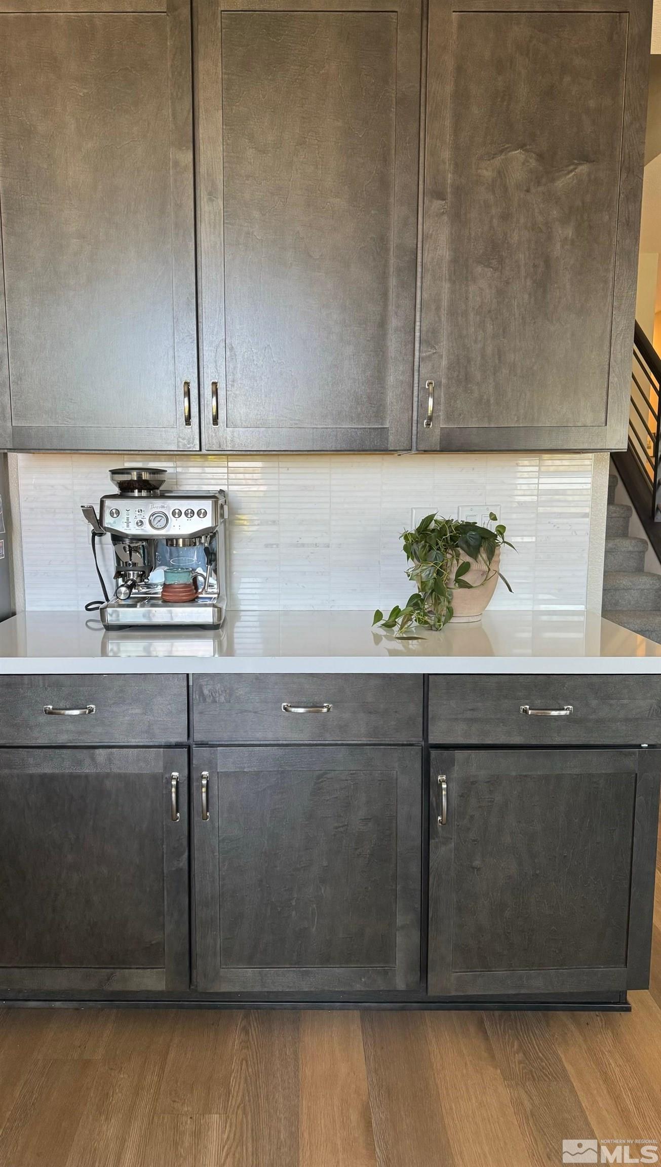2833 Thistle Pine Court Reno, NV 89521 - Photo 7 of 25 a kitchen with a sink and cabinets