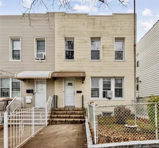 a front view of a house with a door