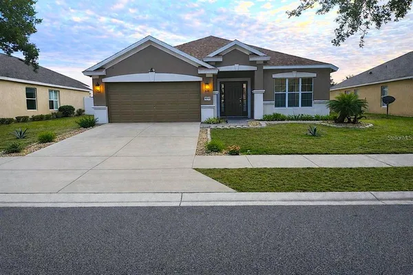 front view of a house and a yard