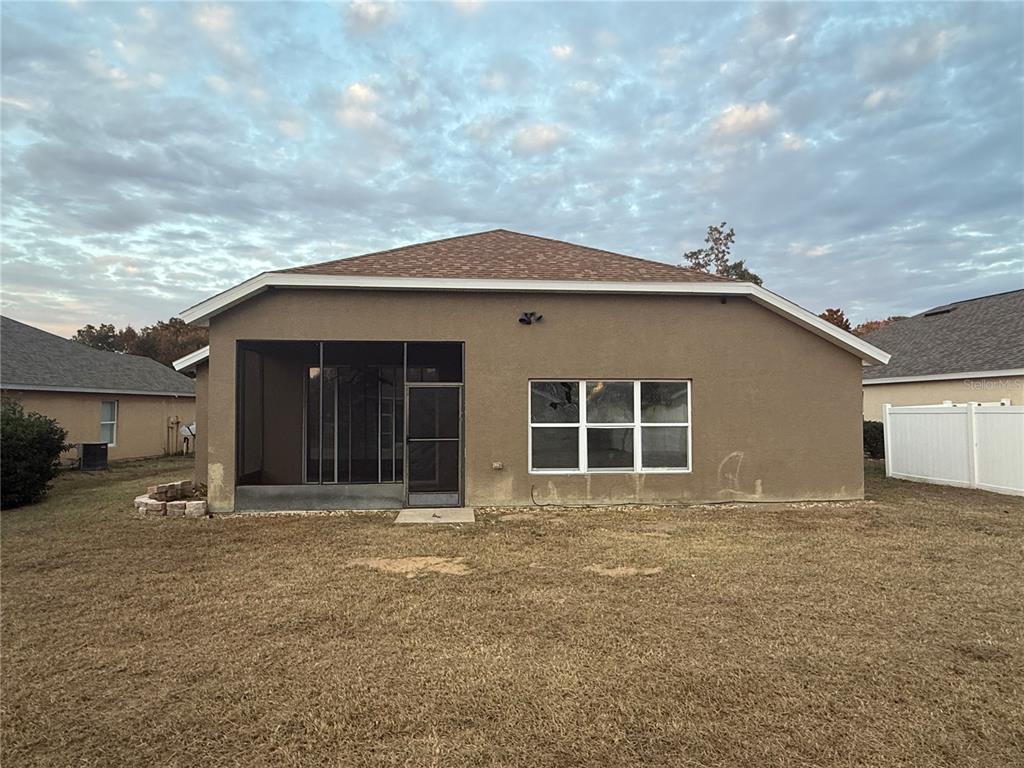 5000 Southwest 40th Place Ocala, FL 34474 - Photo 5 of 19 a house with a outdoor space