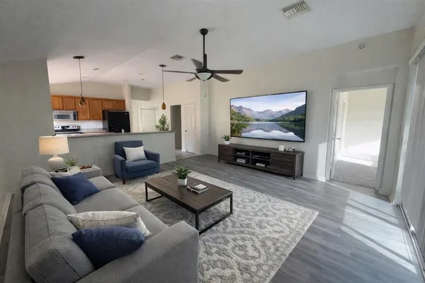 a living room with furniture and a fireplace