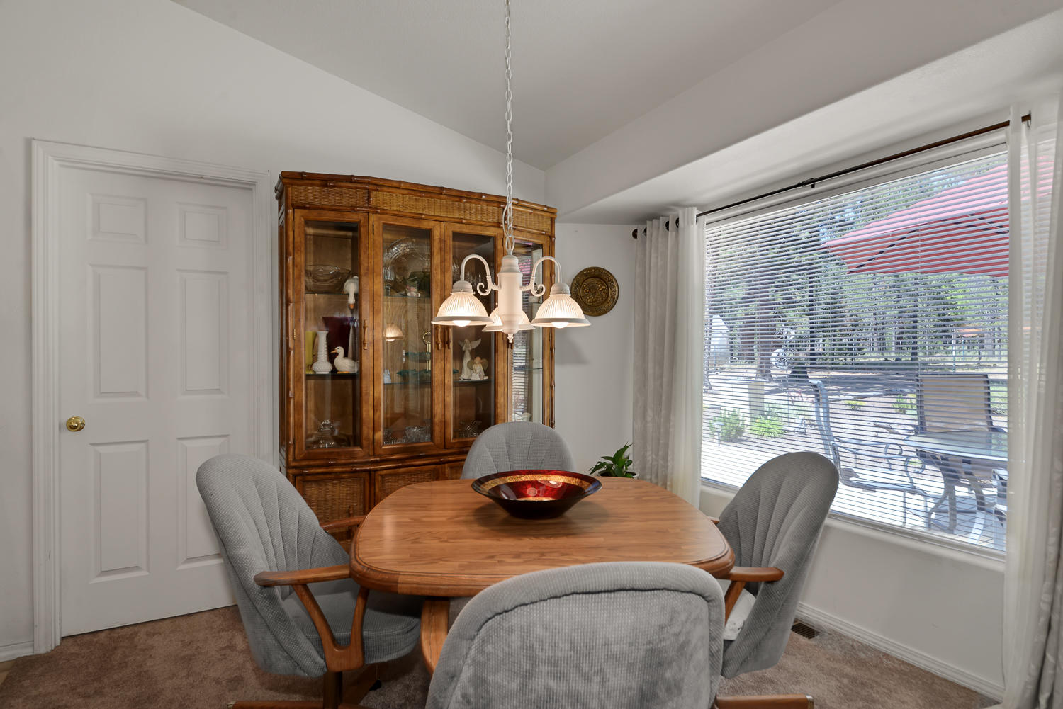 52311 Ammon Road La Pine, OR 97739 - Photo 16 of 39 a view of a dining room with furniture window and outside view