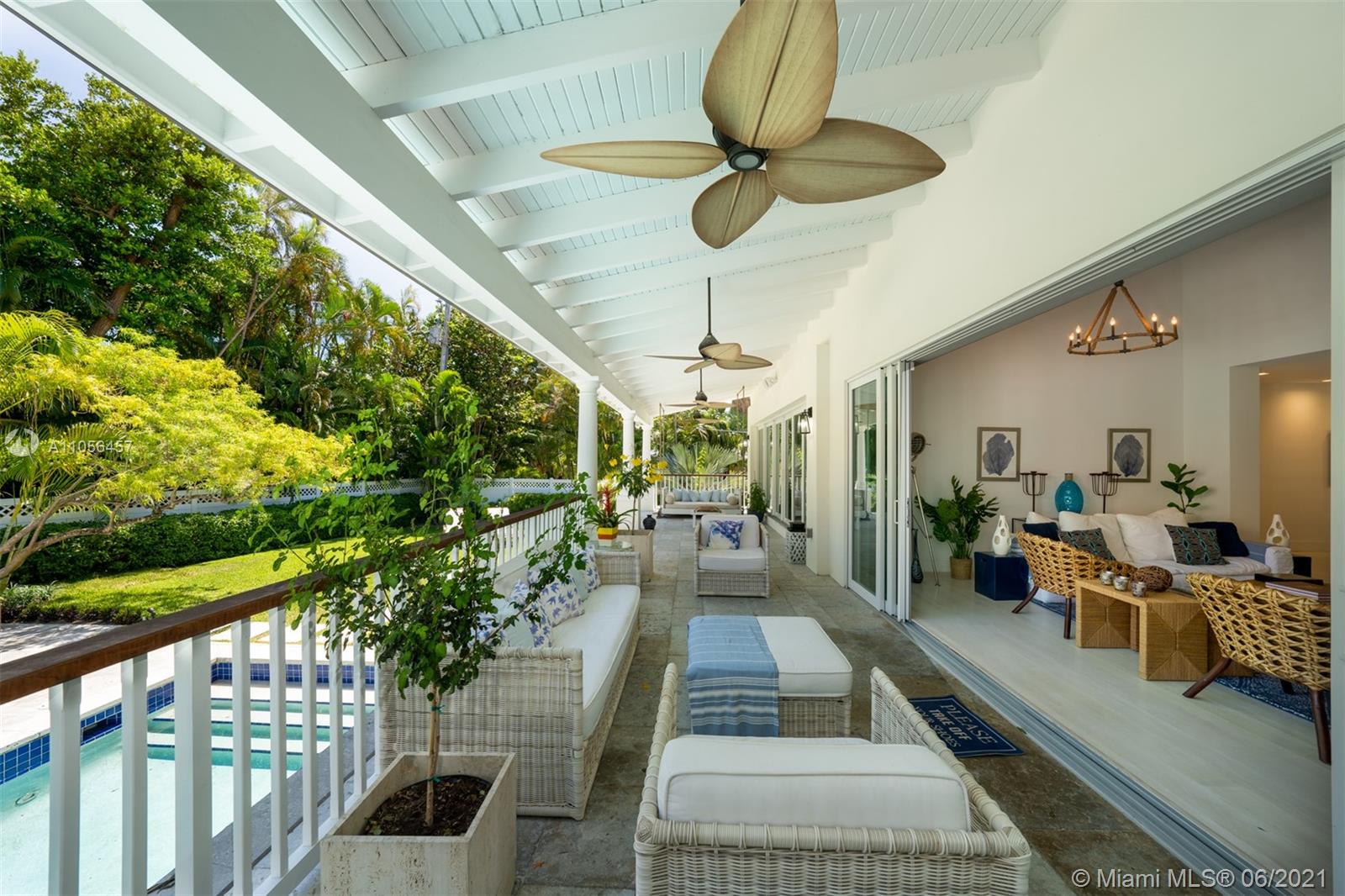 320 Pacific Road Key Biscayne, FL 33149 - Photo 19 of 27 a view of a porch with furniture