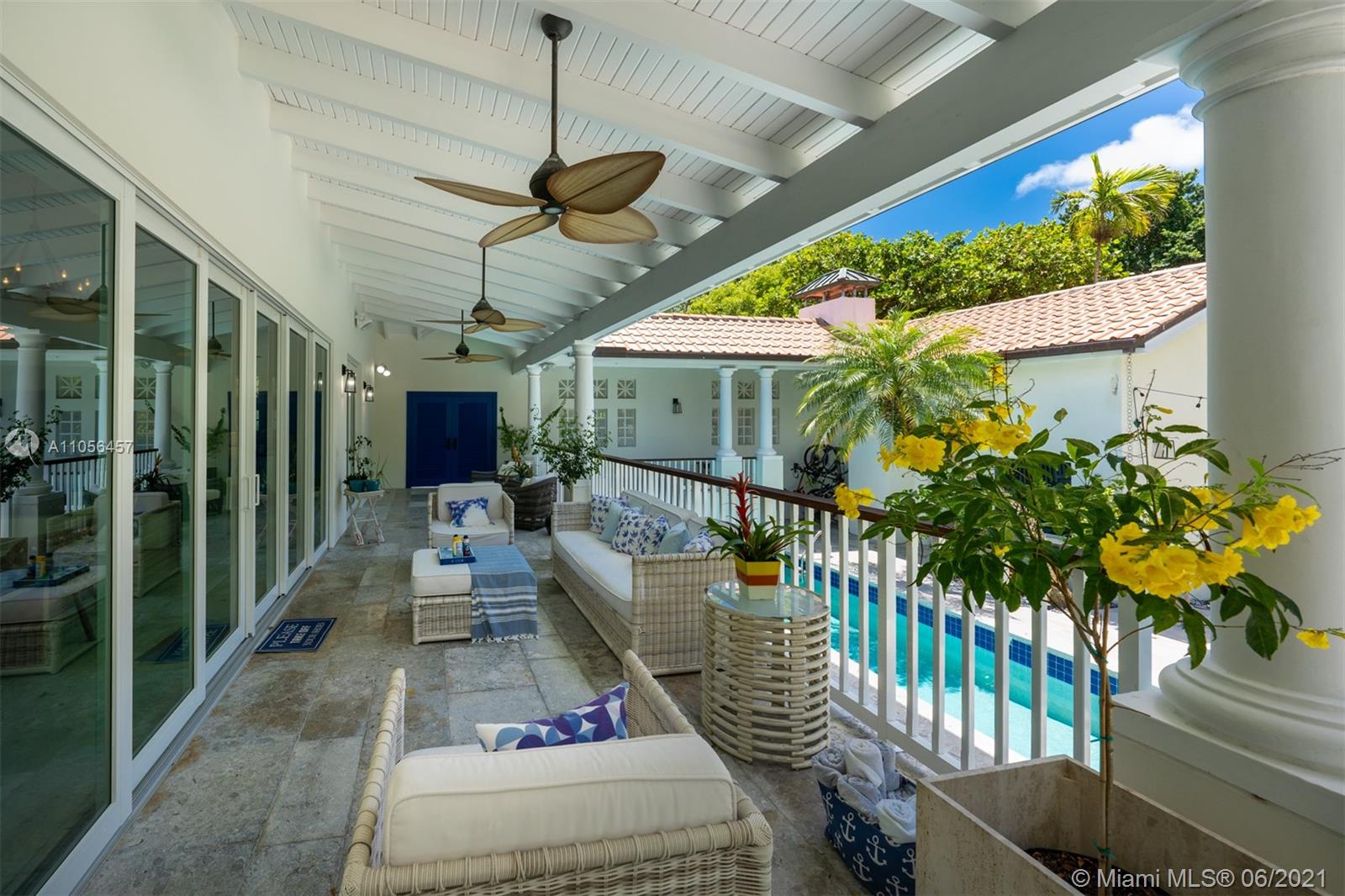 320 Pacific Road Key Biscayne, FL 33149 - Photo 3 of 27 a balcony with furniture