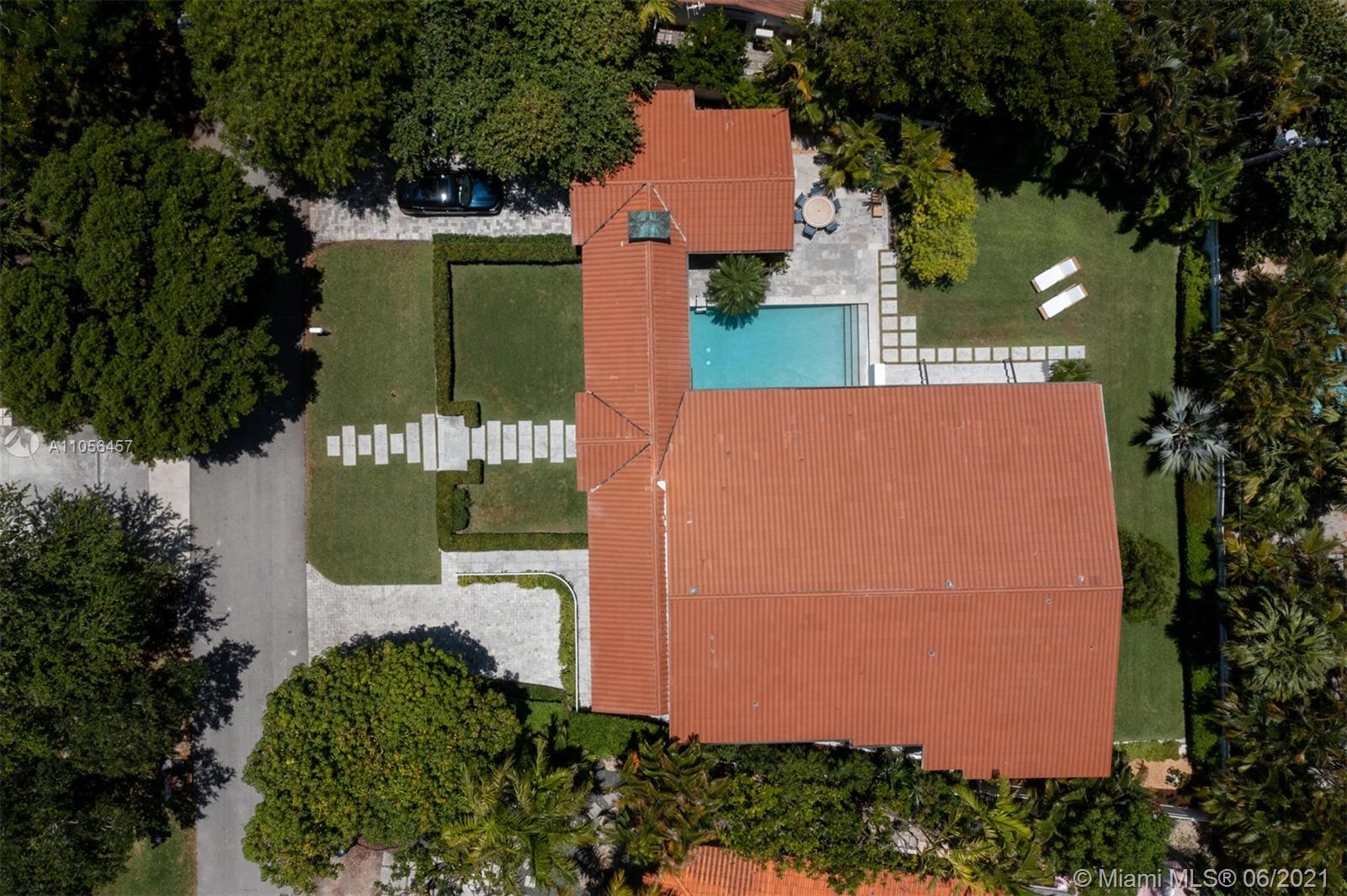 320 Pacific Road Key Biscayne, FL 33149 - Photo 25 of 27 an aerial view of a house with a yard and garden
