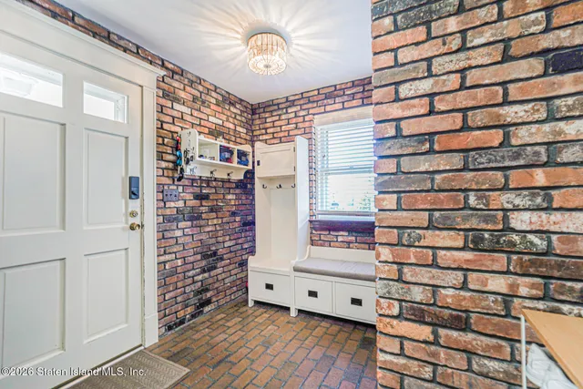 a view of wooden floor with windows