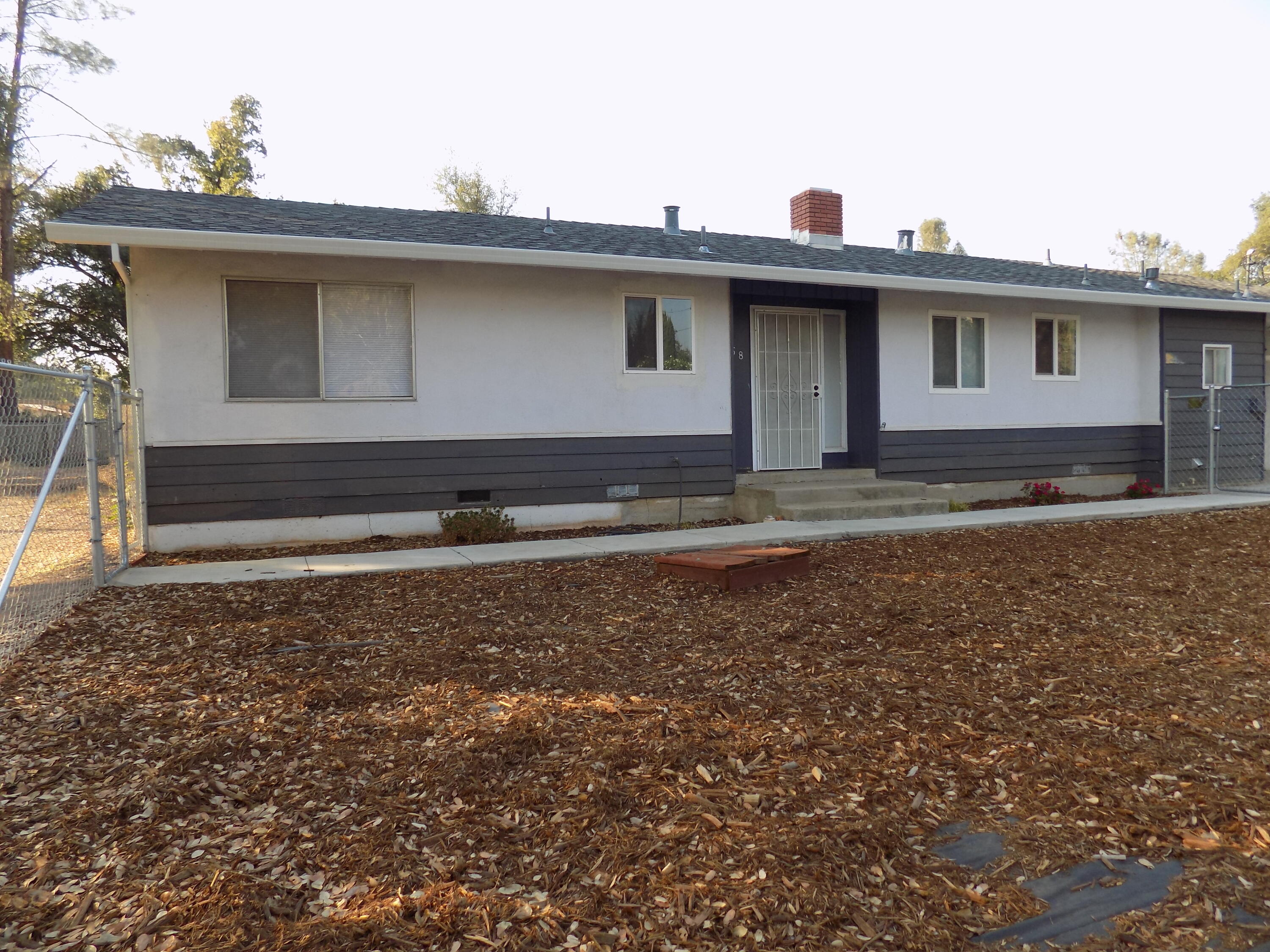 7658 Happy Valley Road Anderson, CA 96007 - Photo 1 of 25 a view of a house with a yard