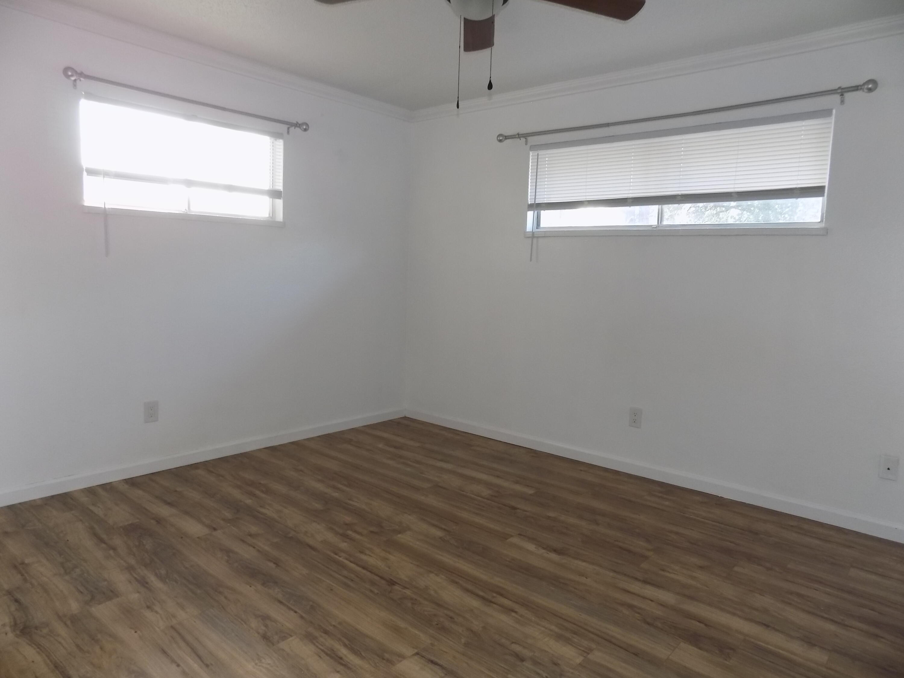7658 Happy Valley Road Anderson, CA 96007 - Photo 16 of 25 a view of a small space with wooden floor and a window