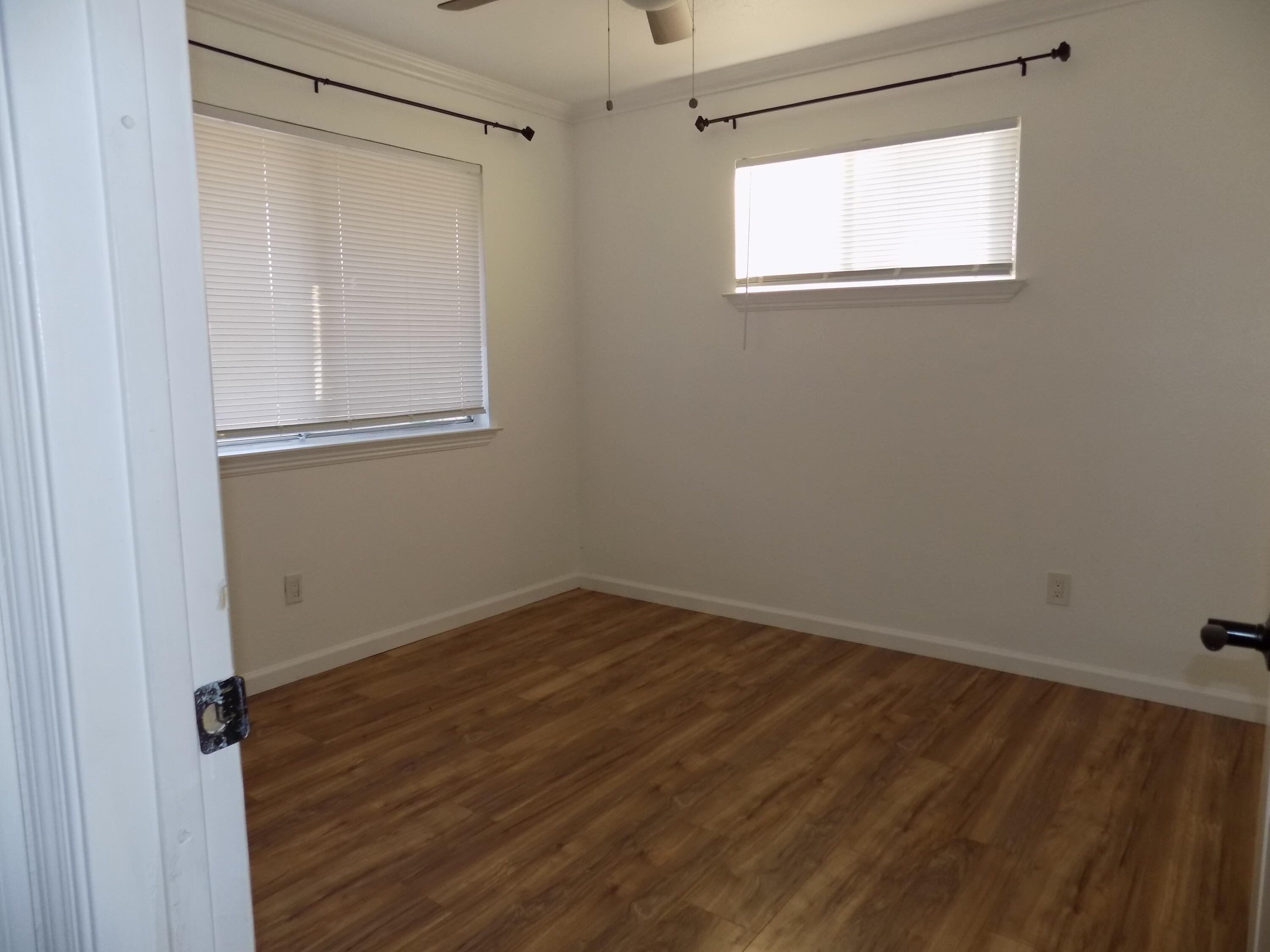 7658 Happy Valley Road Anderson, CA 96007 - Photo 17 of 25 a view of a small space with wooden floor and a window