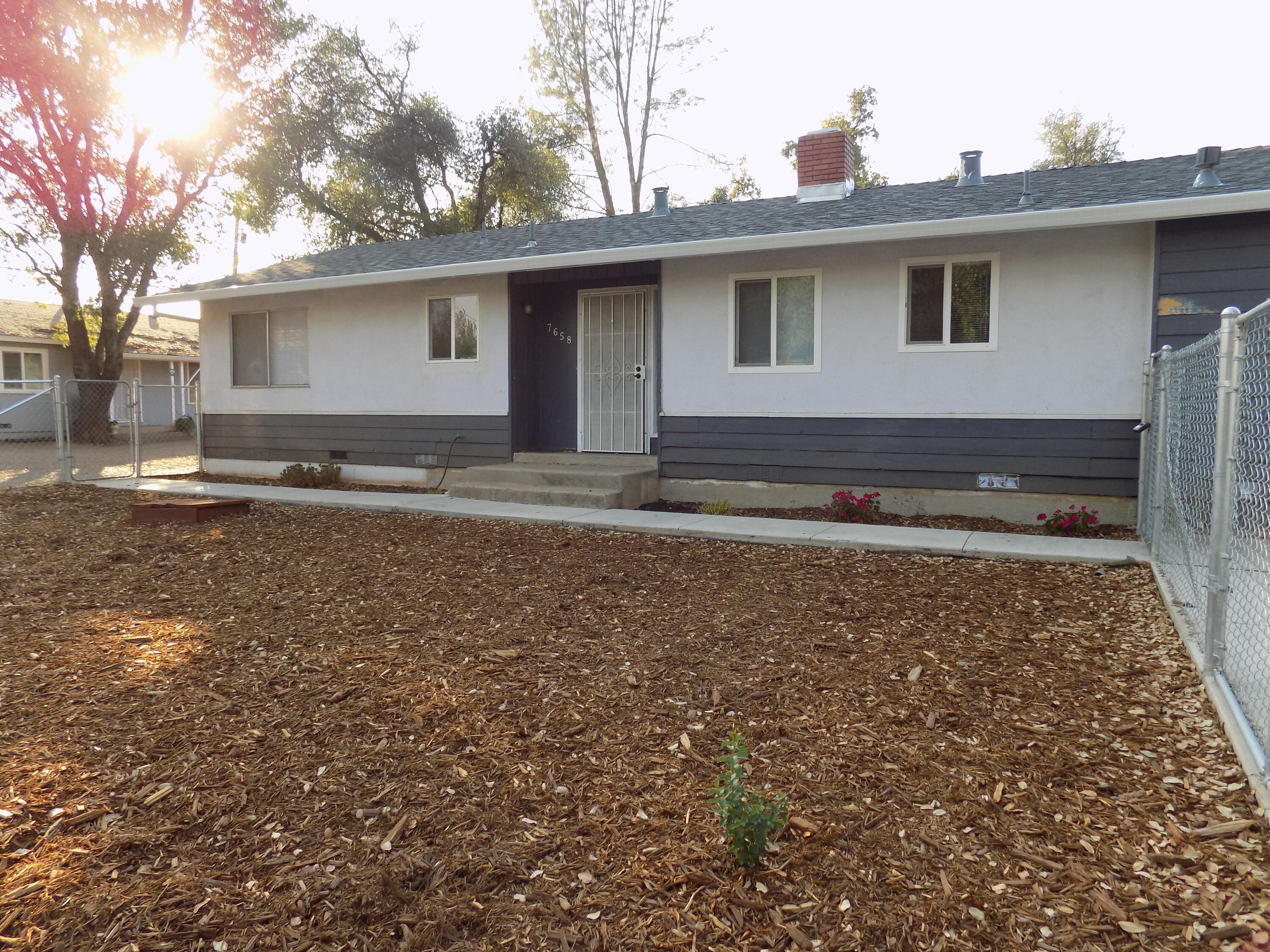 7658 Happy Valley Road Anderson, CA 96007 - Photo 2 of 25 a view of a house with a yard