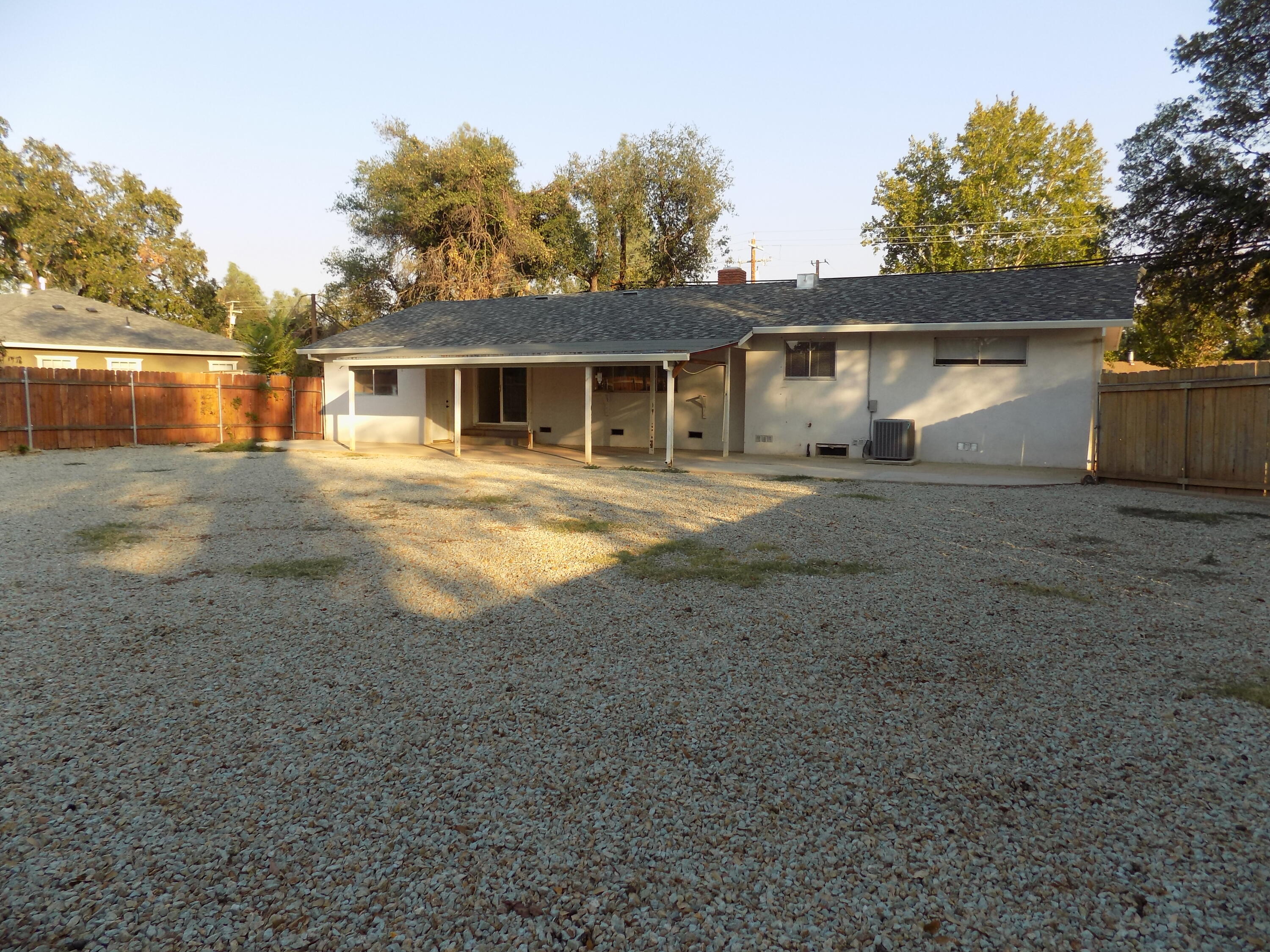 7658 Happy Valley Road Anderson, CA 96007 - Photo 22 of 25 front view of a house with a yard