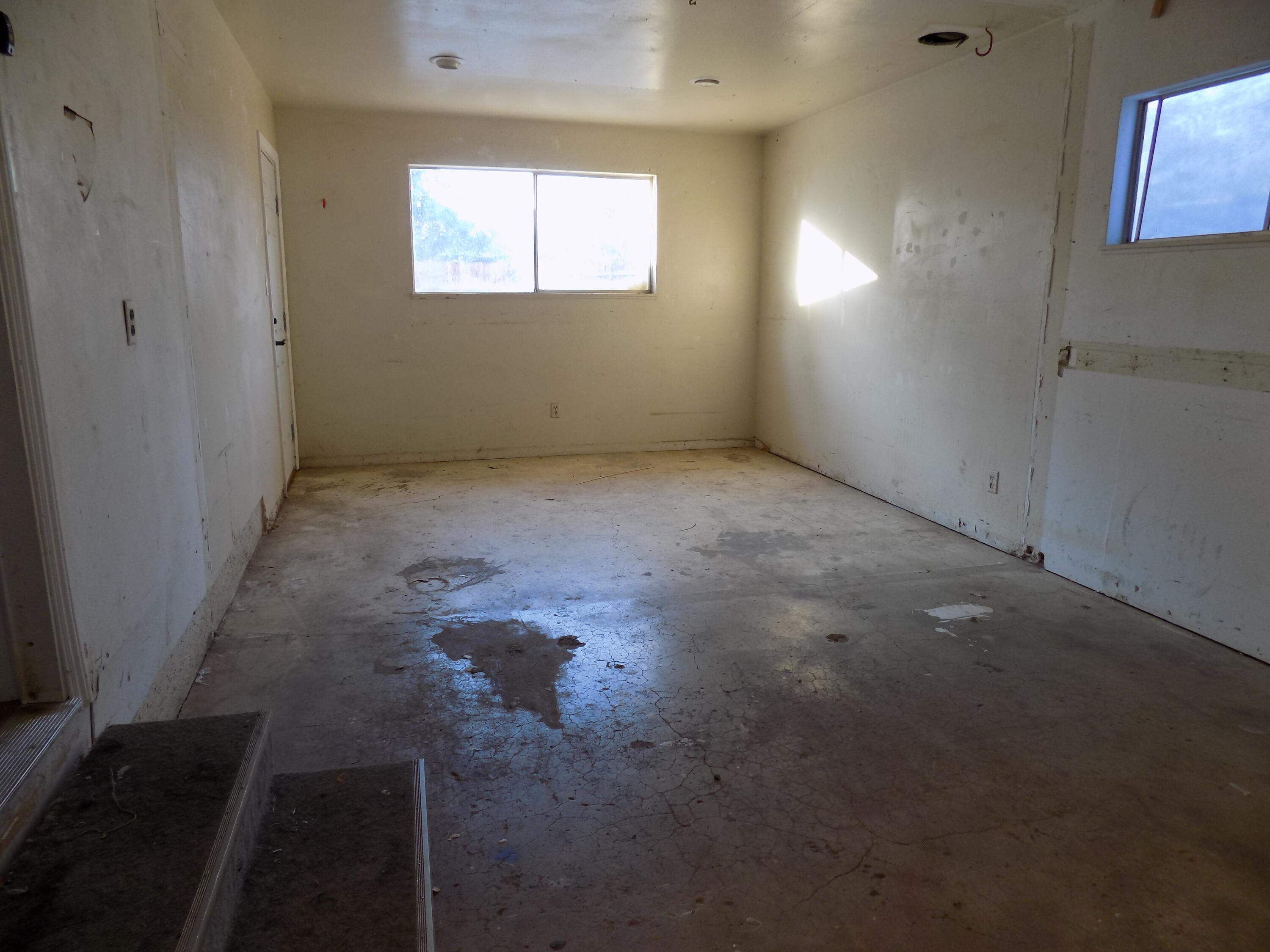 7658 Happy Valley Road Anderson, CA 96007 - Photo 24 of 25 an empty room with windows