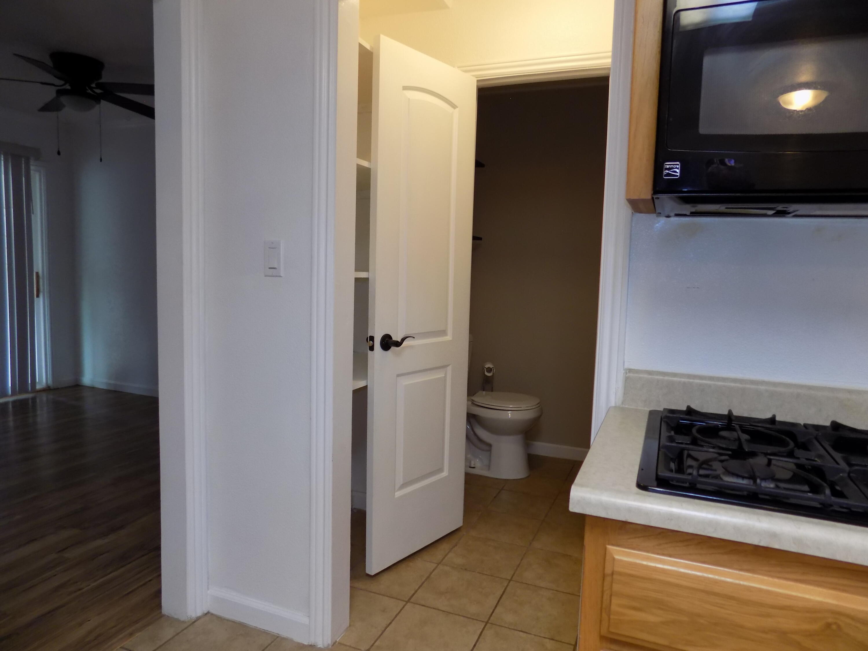 7658 Happy Valley Road Anderson, CA 96007 - Photo 10 of 25 a bathroom with a toilet and a shower