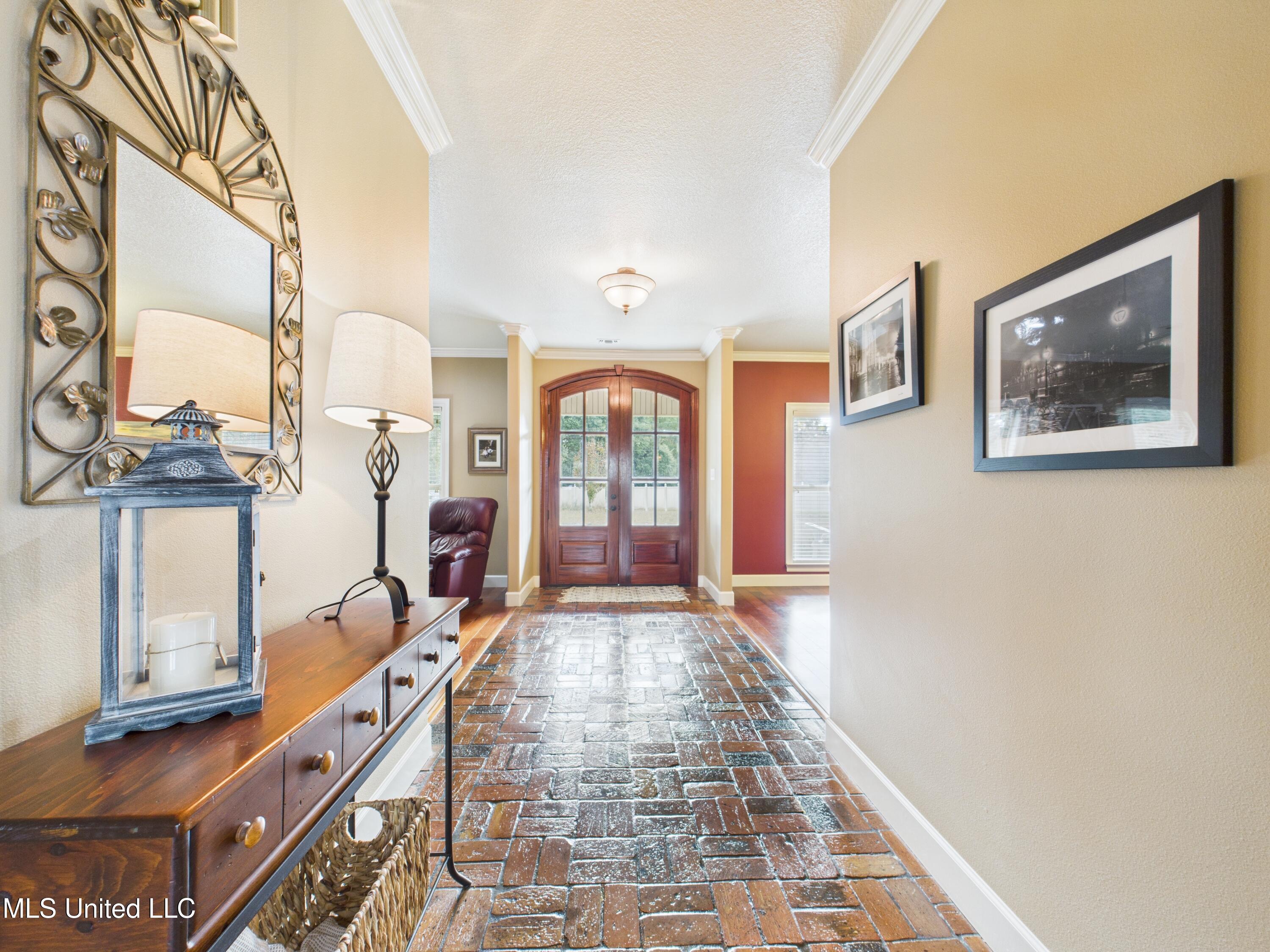 7414 Fountainbleau Road Ocean Springs, MS 39564 - Photo 6 of 49 CAM04449G0-PR0026-STILL023