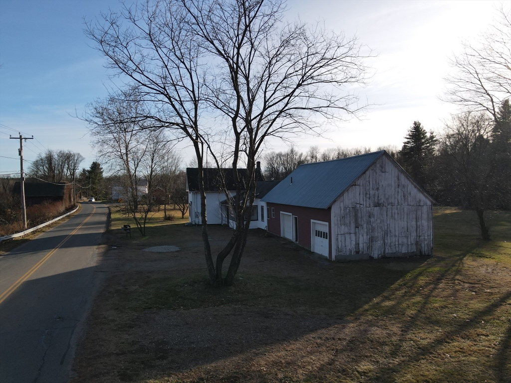 336 Plain Road Greenfield, MA 01301 - Photo 24 of 30 a view of a house with a yard