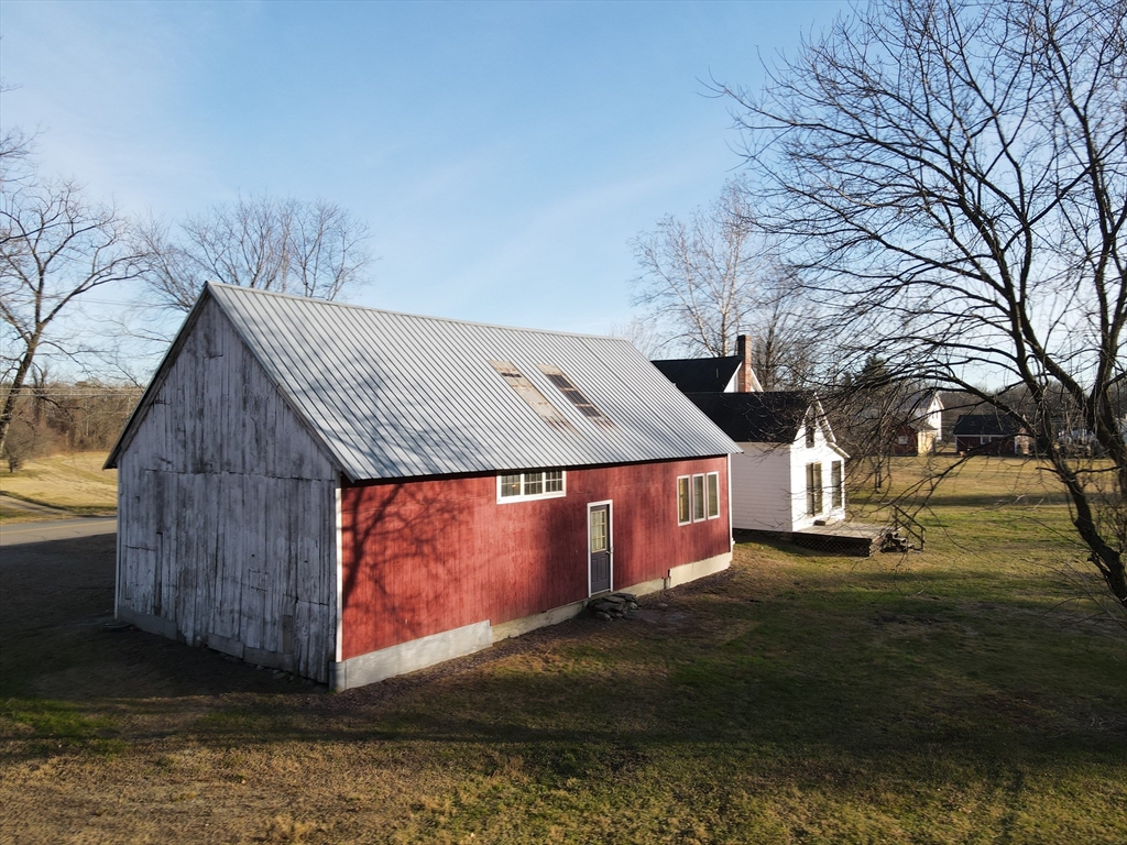 336 Plain Road Greenfield, MA 01301 - Photo 25 of 30 a view of a house with a yard