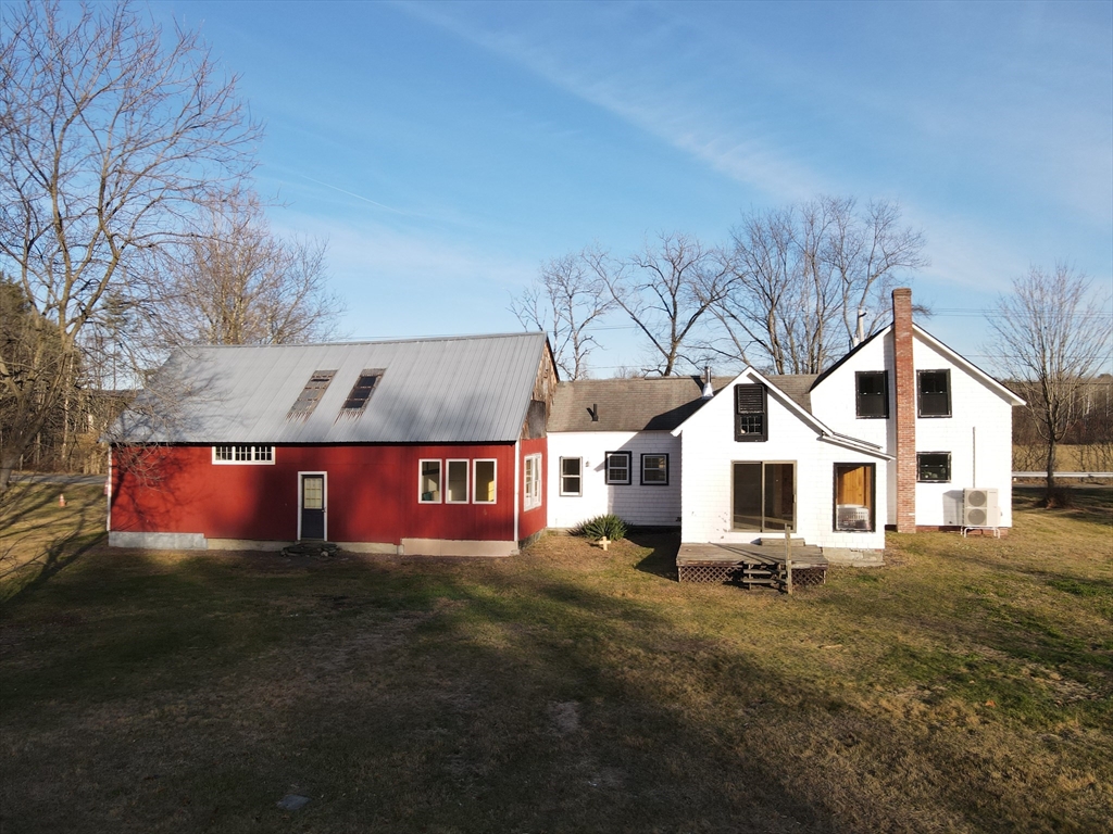 336 Plain Road Greenfield, MA 01301 - Photo 27 of 30 a view of an house with backyard space and balcony