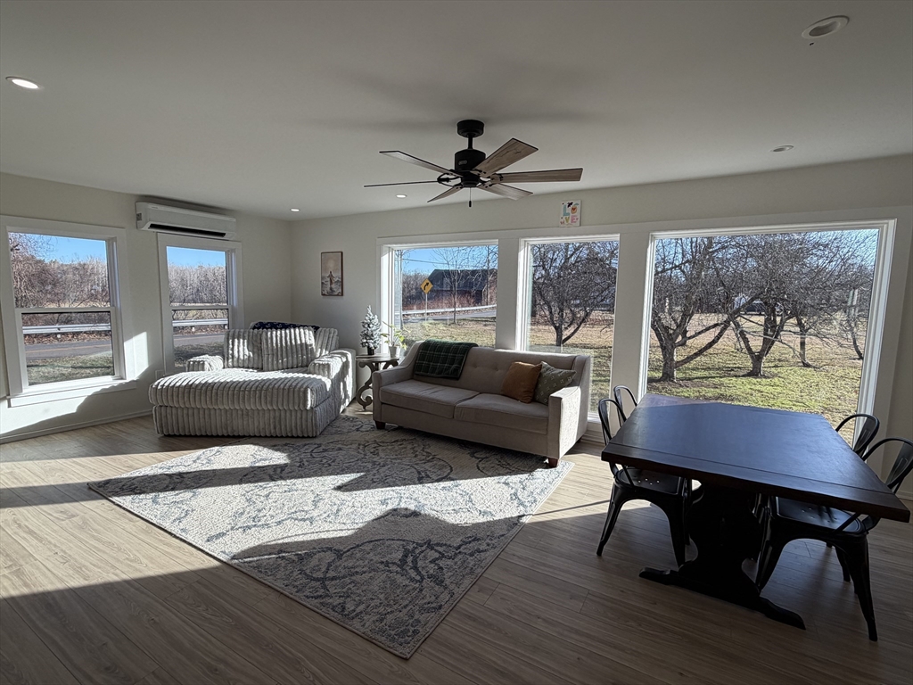 336 Plain Road Greenfield, MA 01301 - Photo 9 of 30 a living room with furniture and a large window