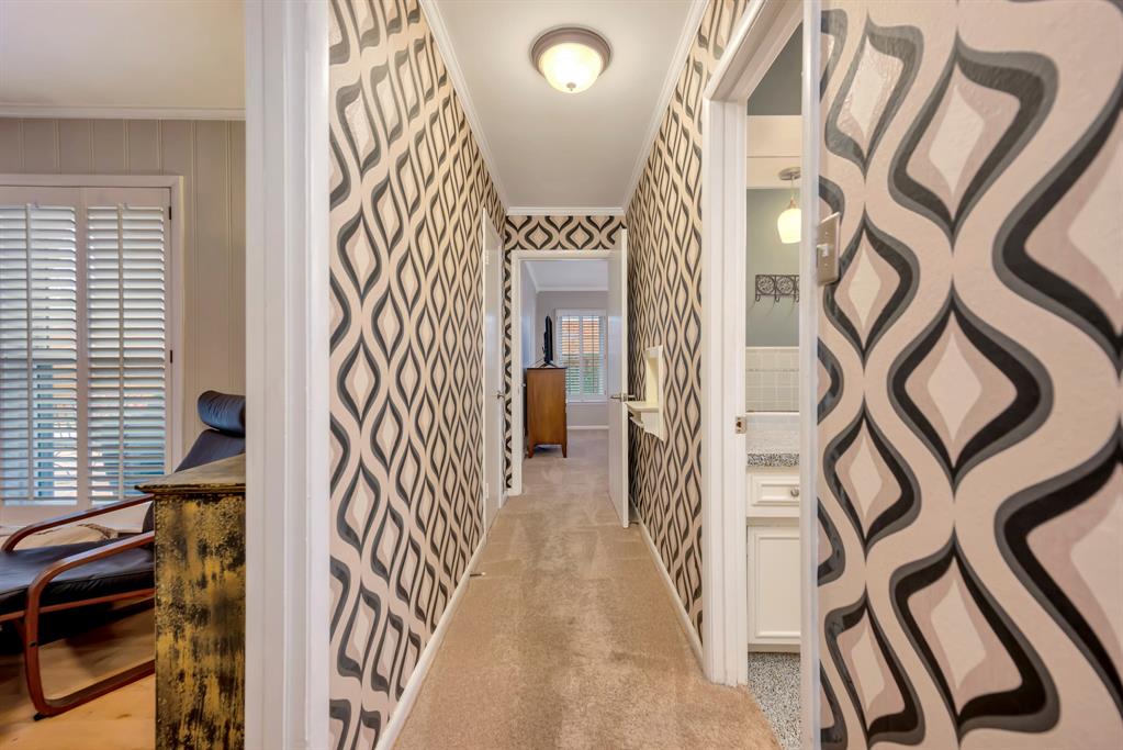 10005 Ridgehaven Drive Dallas, TX 75238 - Photo 14 of 27 a view of a hallway with a door and a window