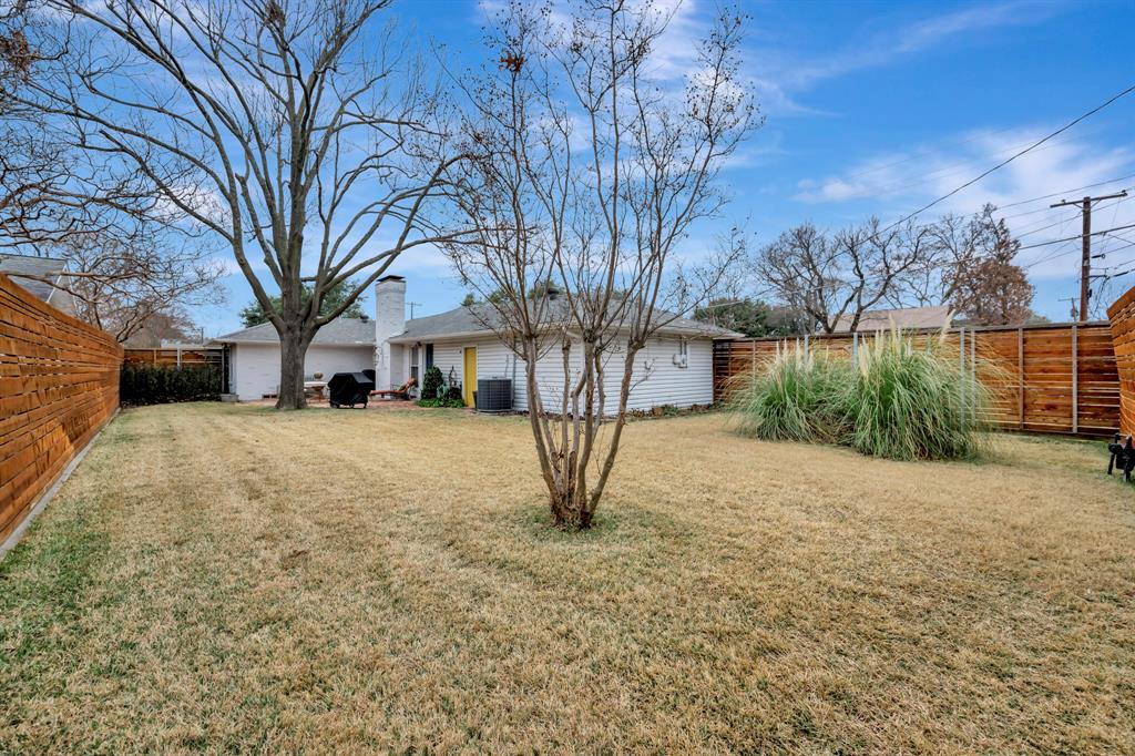 10005 Ridgehaven Drive Dallas, TX 75238 - Photo 25 of 27 a view of large tree in front of a building