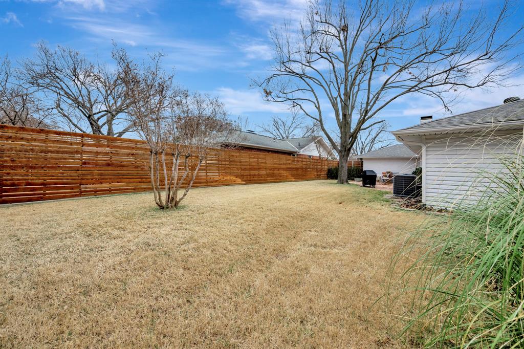 10005 Ridgehaven Drive Dallas, TX 75238 - Photo 26 of 27 a view of yard covered with snow in front of house