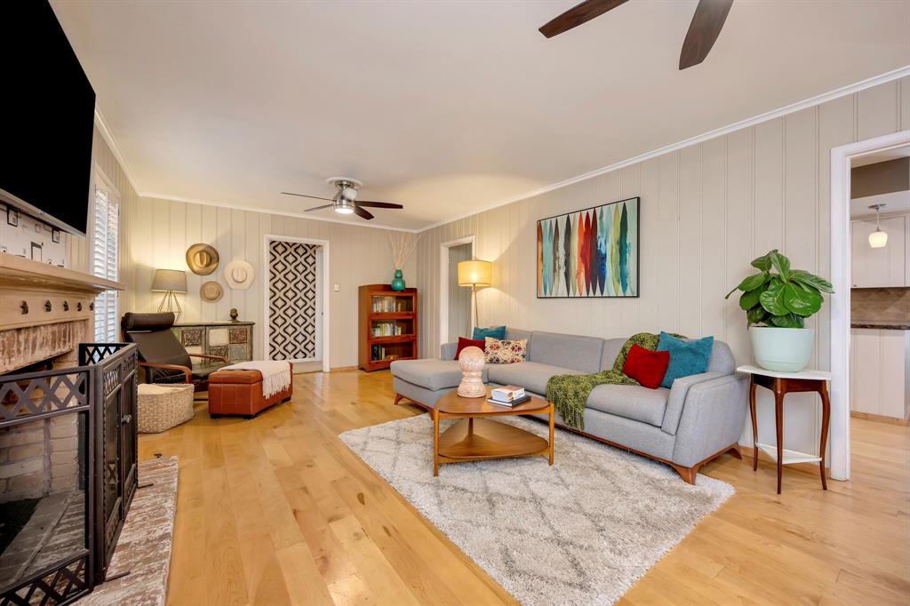 10005 Ridgehaven Drive Dallas, TX 75238 - Photo 7 of 27 a living room with furniture and a flat screen tv