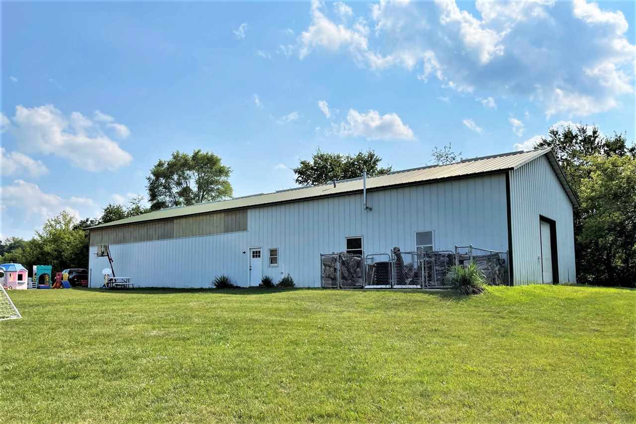 7545 Kishwaukee Road Stillman Valley, IL 61084 - Photo 4 of 61 a house view with a garden space