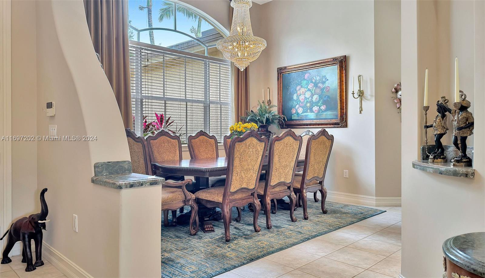 9750 Southwest 143rd Street Miami, FL 33176 - Photo 12 of 41 a dining room with furniture and window