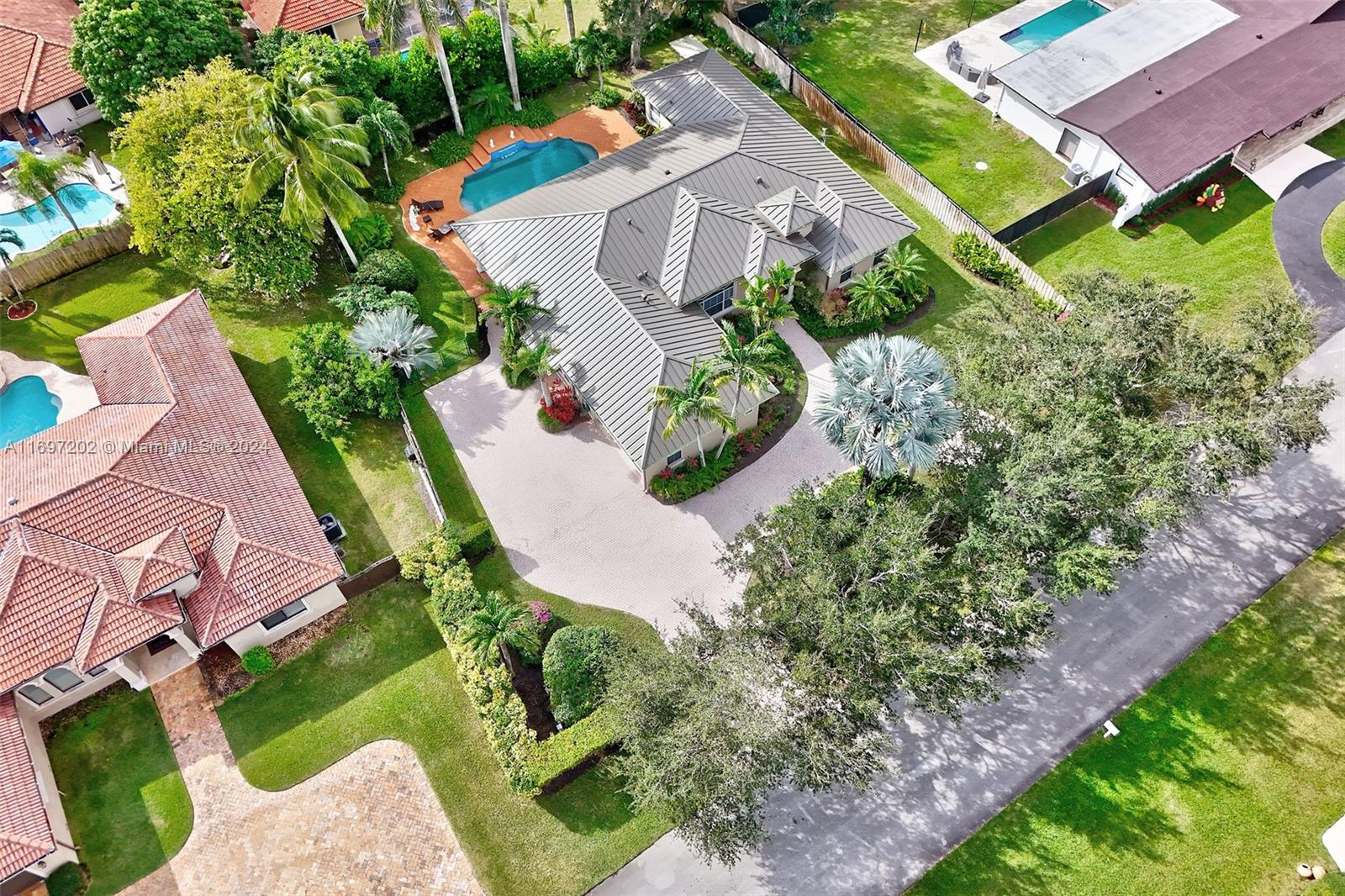 9750 Southwest 143rd Street Miami, FL 33176 - Photo 36 of 41 an aerial view of a house