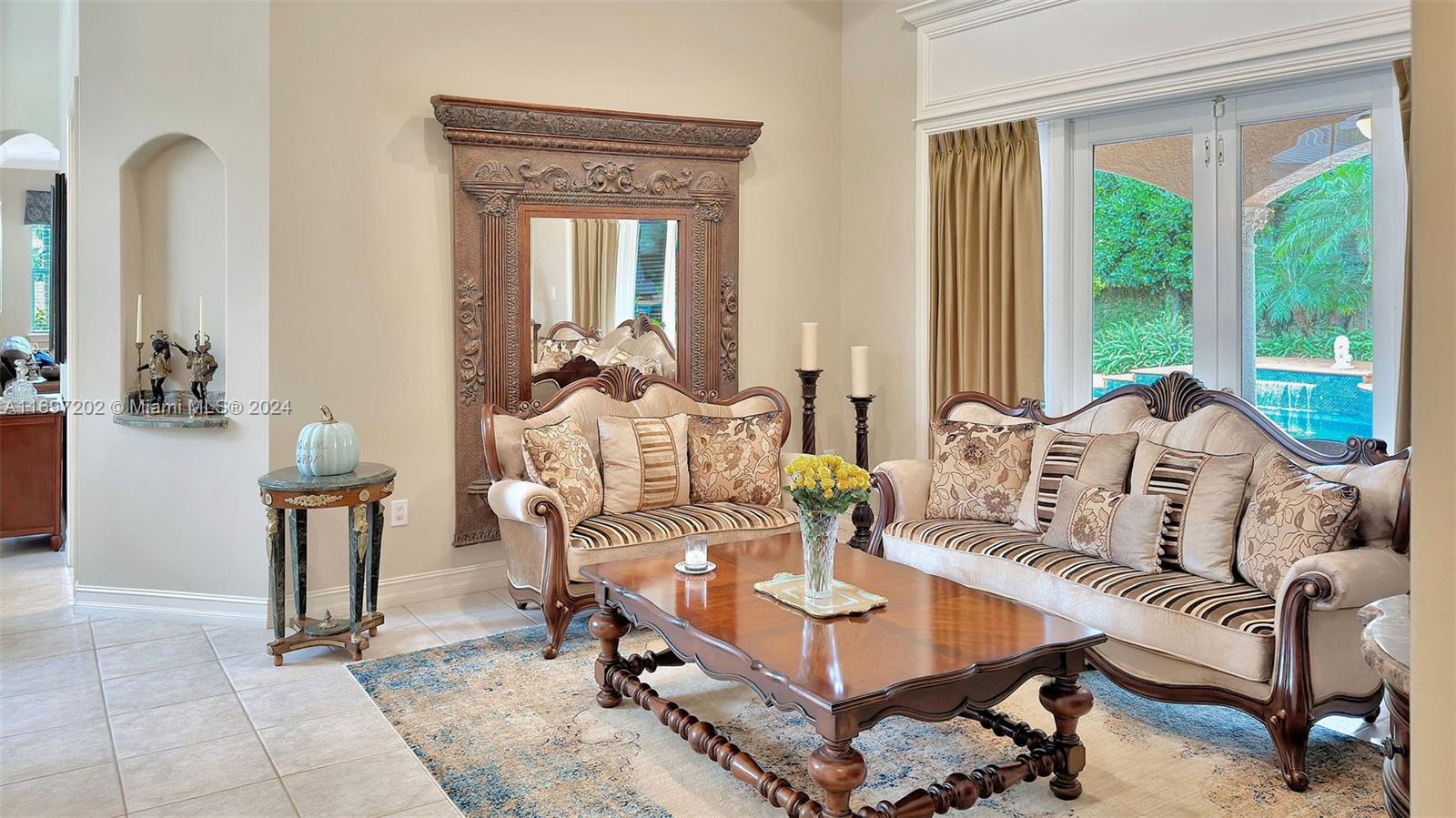 9750 Southwest 143rd Street Miami, FL 33176 - Photo 10 of 41 a living room with furniture and a large window