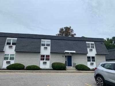 10 White Gate Road, Unit J Wappingers Falls, NY 12590 - Photo 1 of 11 a front view of a house with garage