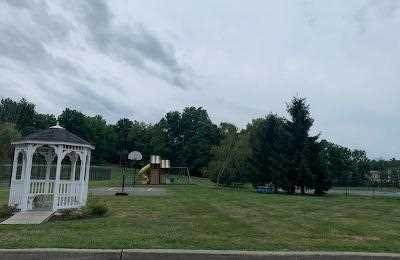 10 White Gate Road, Unit J Wappingers Falls, NY 12590 - Photo 11 of 11 a view of a house with a yard and sitting area