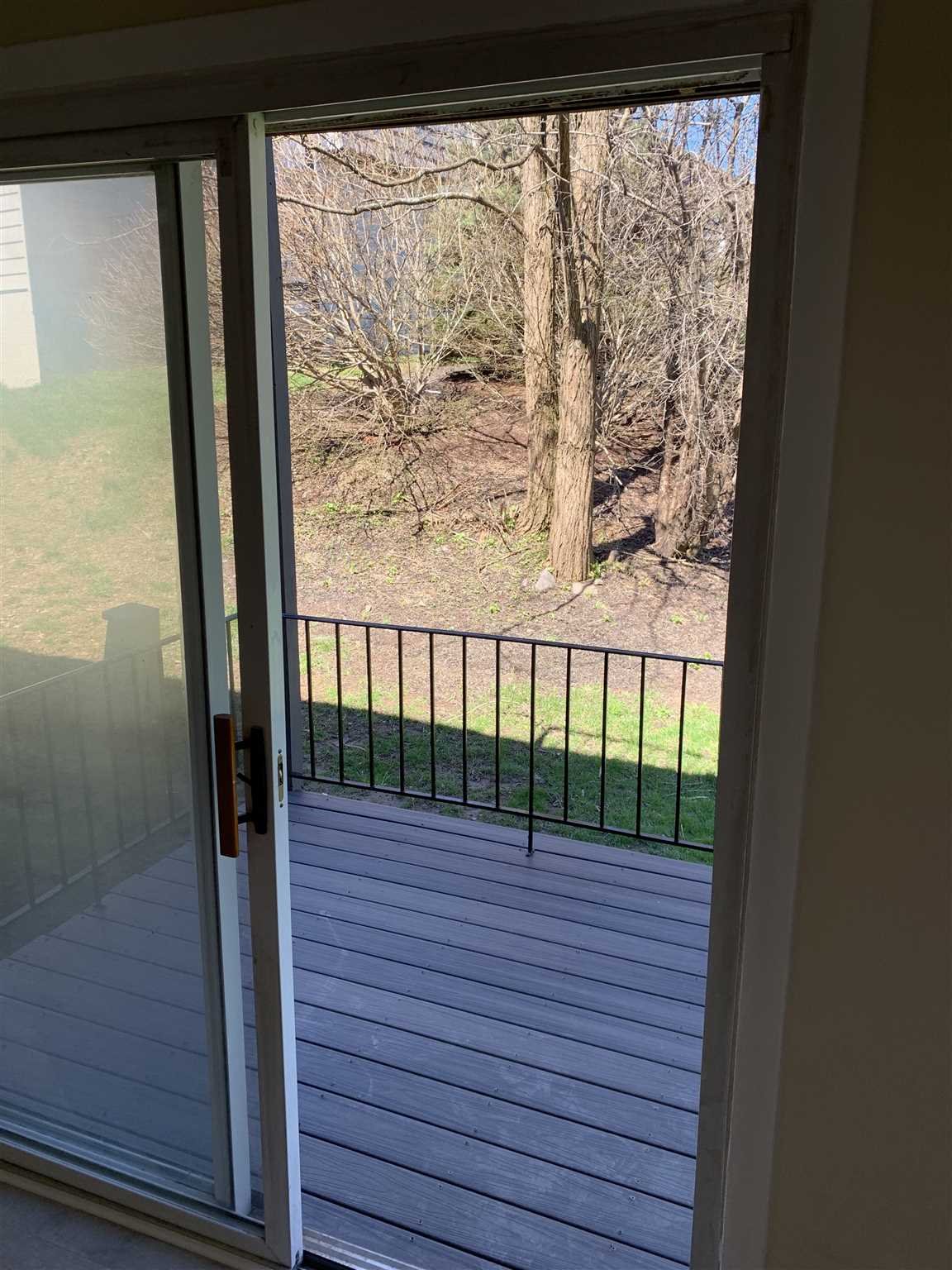 10 White Gate Road, Unit J Wappingers Falls, NY 12590 - Photo 7 of 11 a view of a balcony with wooden floor