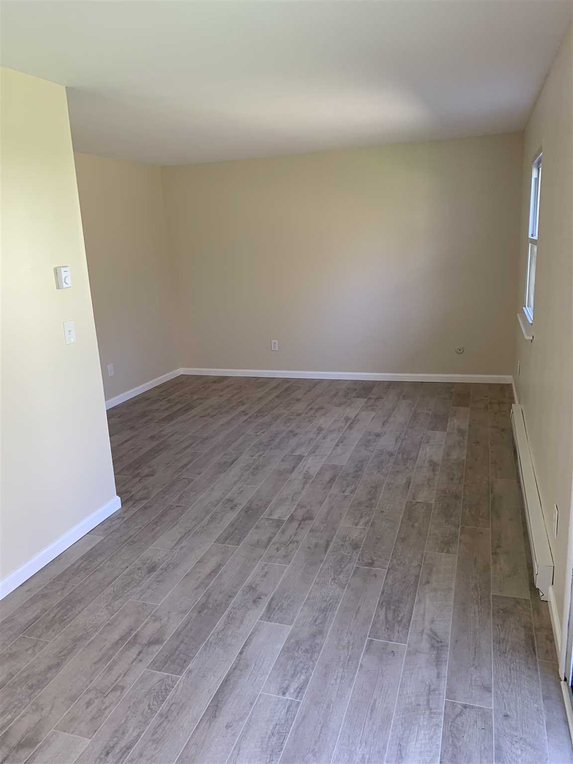 10 White Gate Road, Unit J Wappingers Falls, NY 12590 - Photo 9 of 11 wooden floor in a room