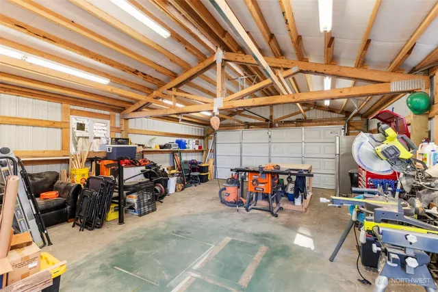 a view of a garage with a table and chairs