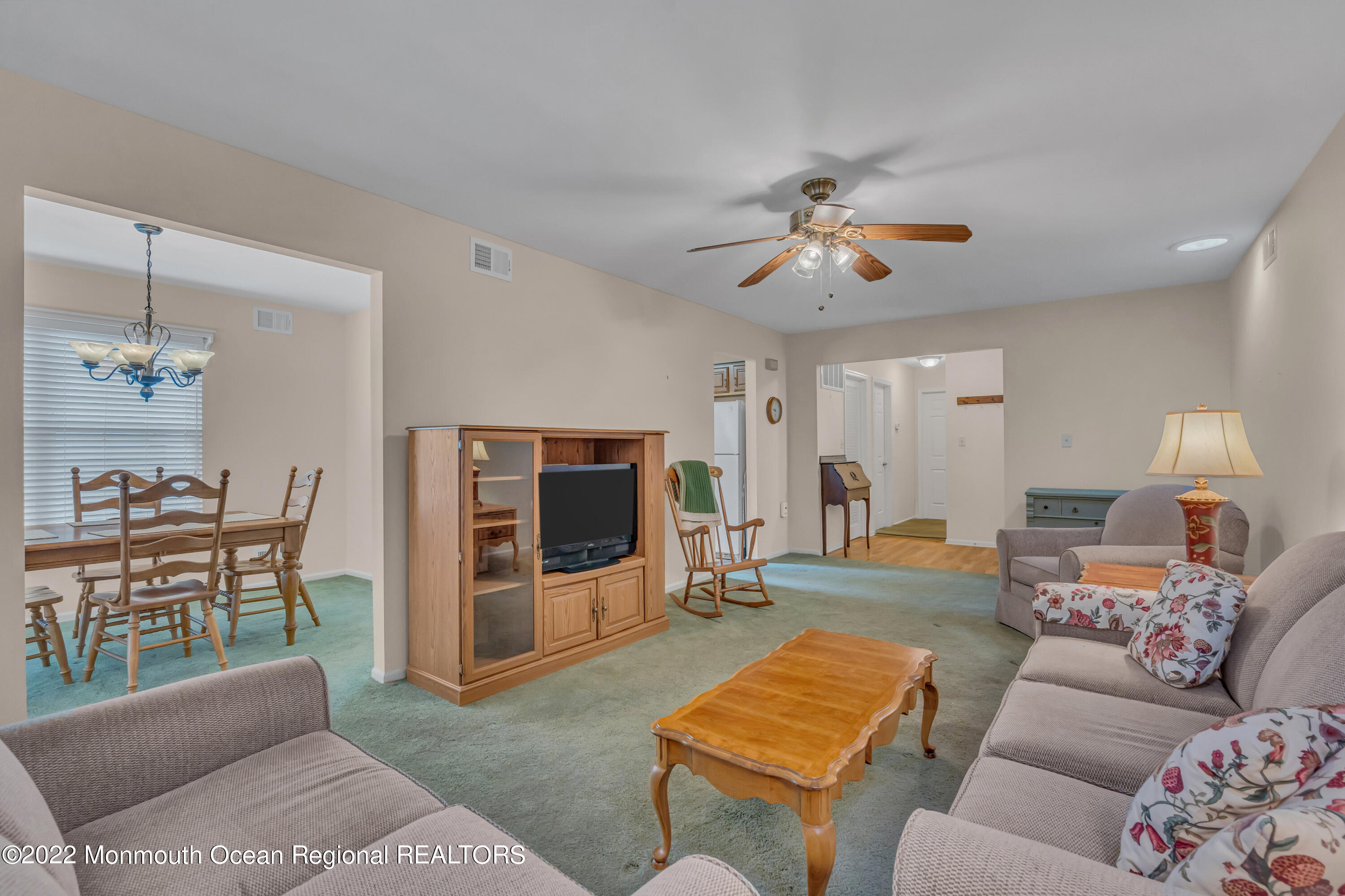 111 Mansfield Drive Brick, NJ 08724 - Photo 14 of 43 a living room with furniture and a flat screen tv