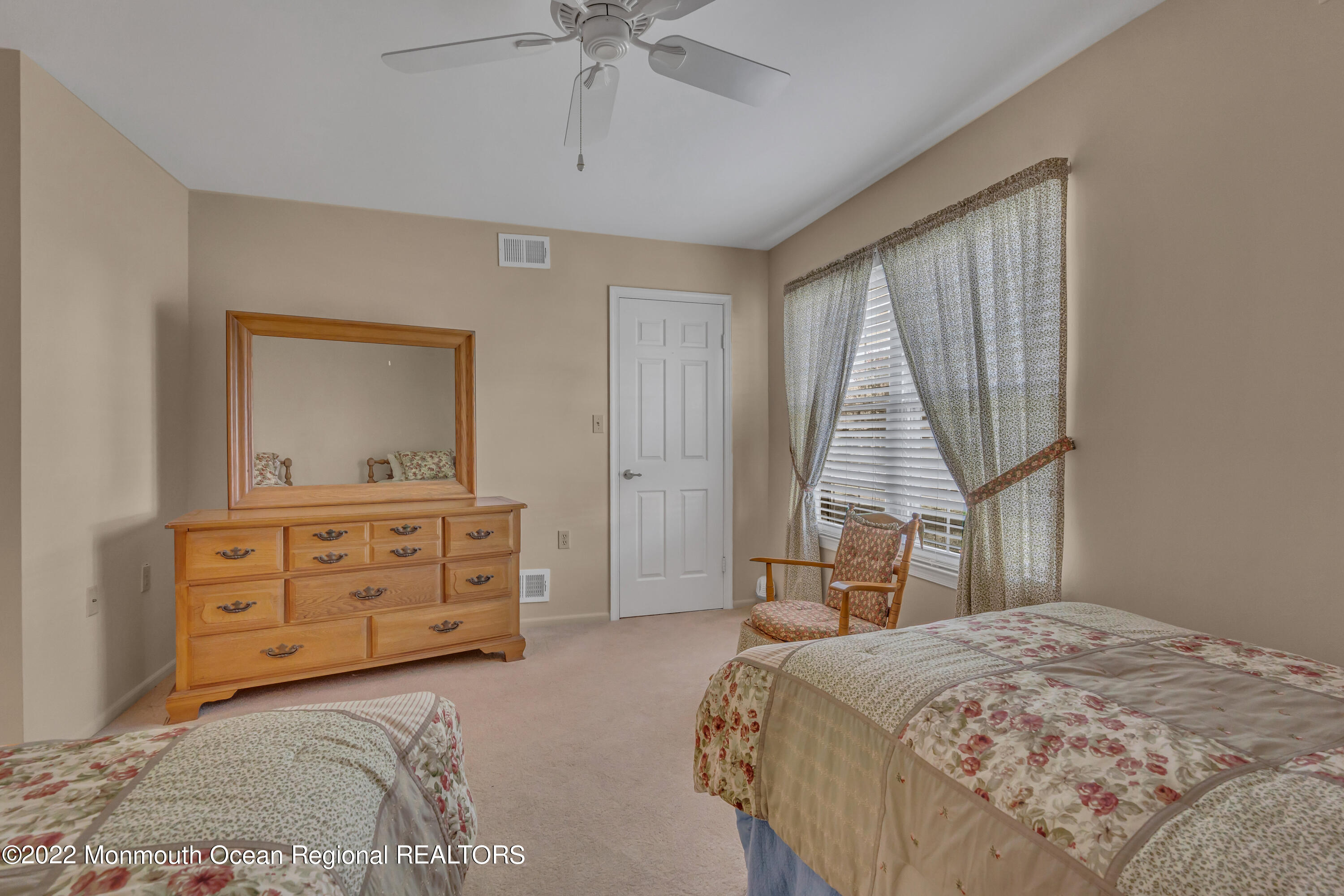 111 Mansfield Drive Brick, NJ 08724 - Photo 24 of 43 a bedroom with a bed and a dresser