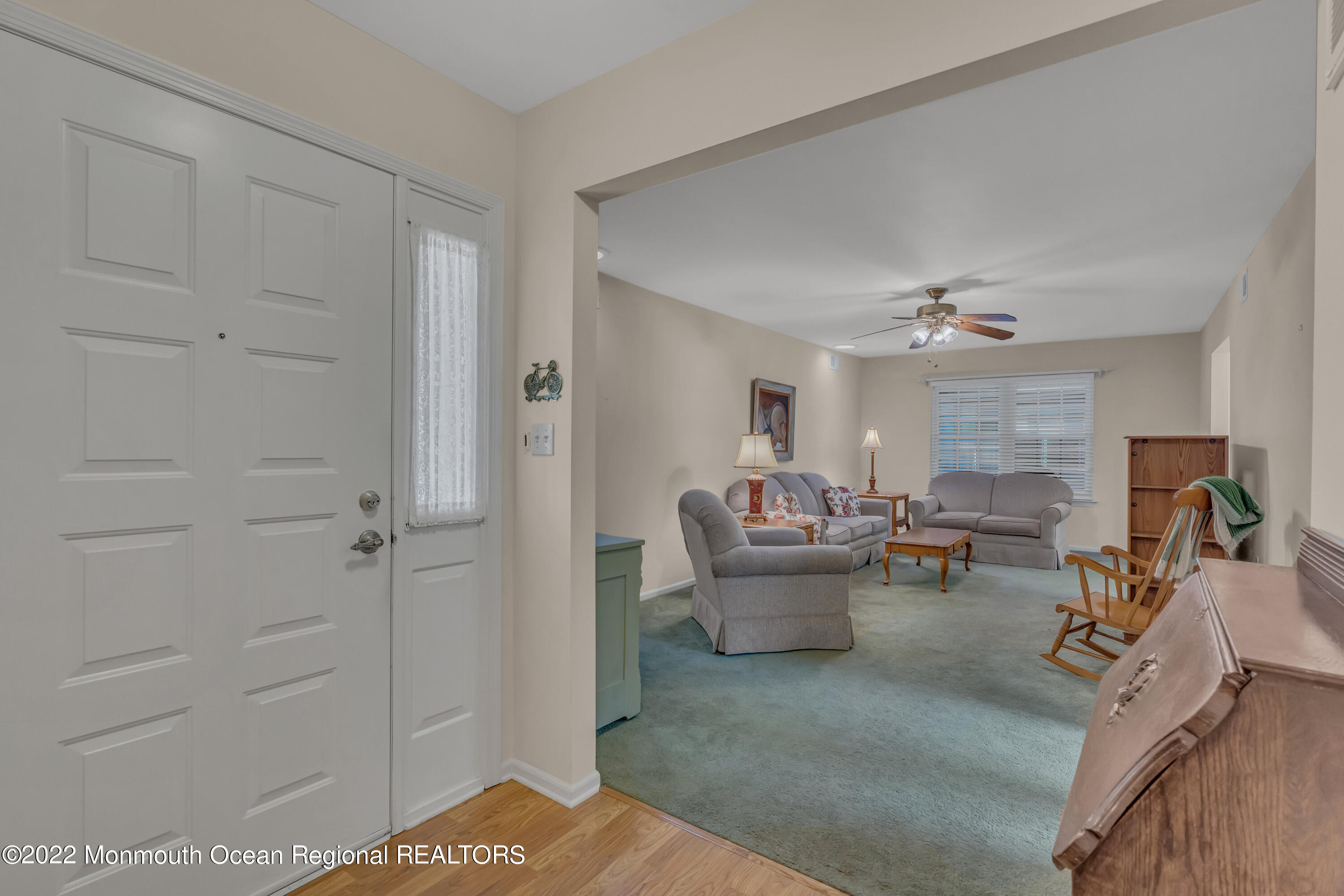 111 Mansfield Drive Brick, NJ 08724 - Photo 10 of 43 a living room with furniture and a fireplace