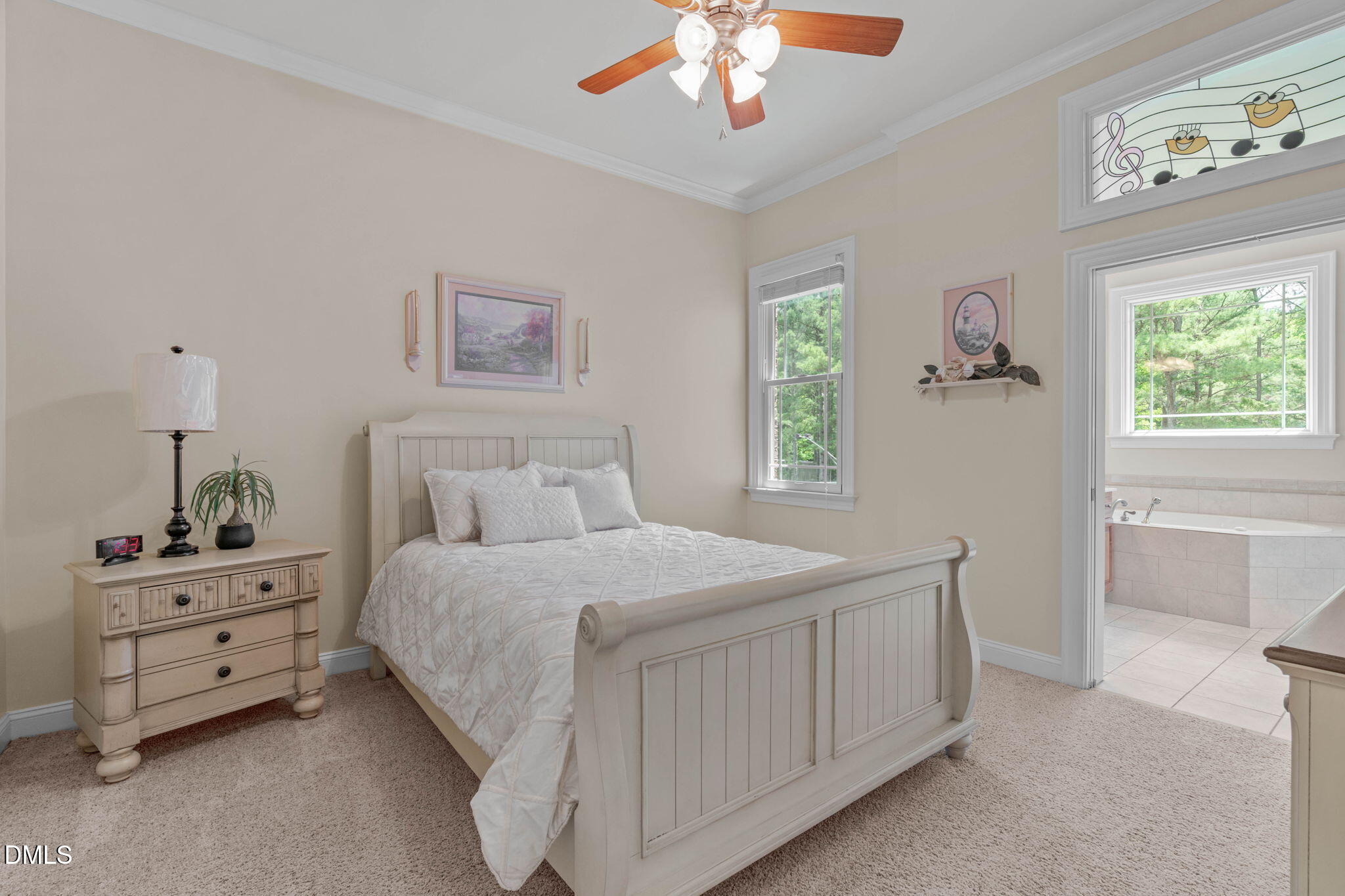 10917 Jordan Road Raleigh, NC 27603 - Photo 31 of 58 a bedroom with a bed and a dresser